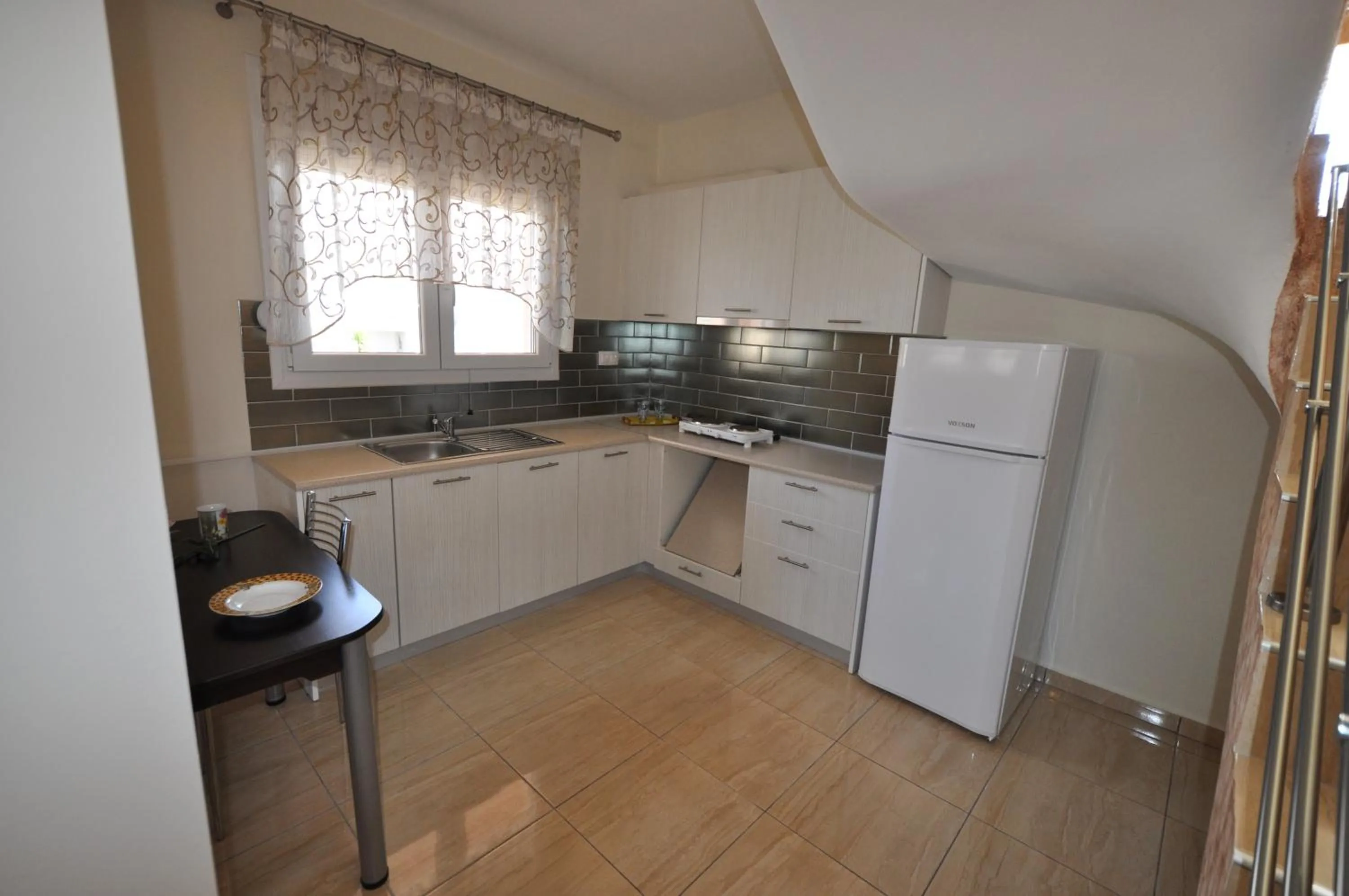 Kitchen or kitchenette in Villa Kaiti