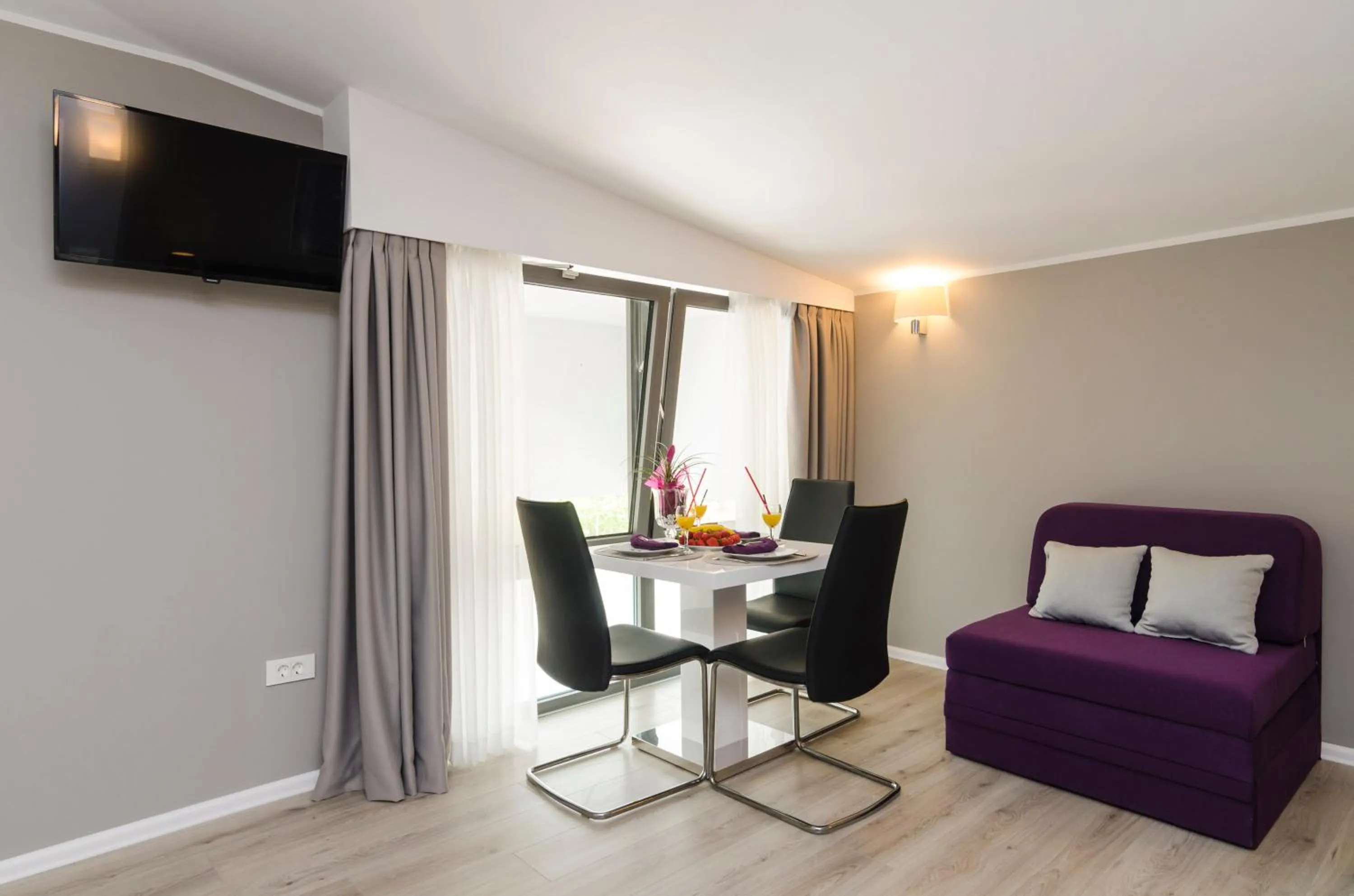 Dining area in Apartments ZoomZoom