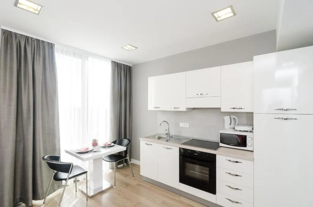 Kitchen or kitchenette in Apartments ZoomZoom