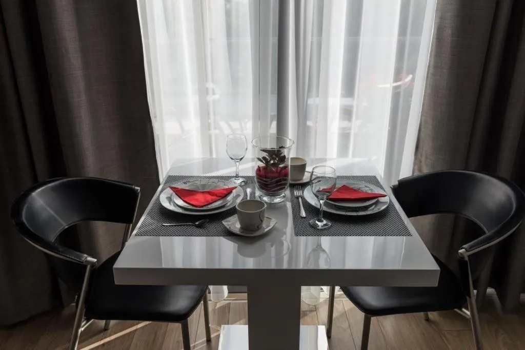 Dining area in Apartments ZoomZoom