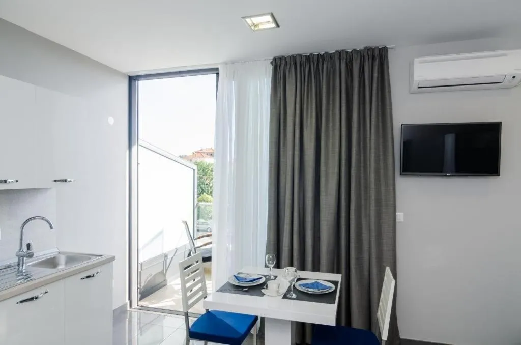 Dining area in Apartments ZoomZoom