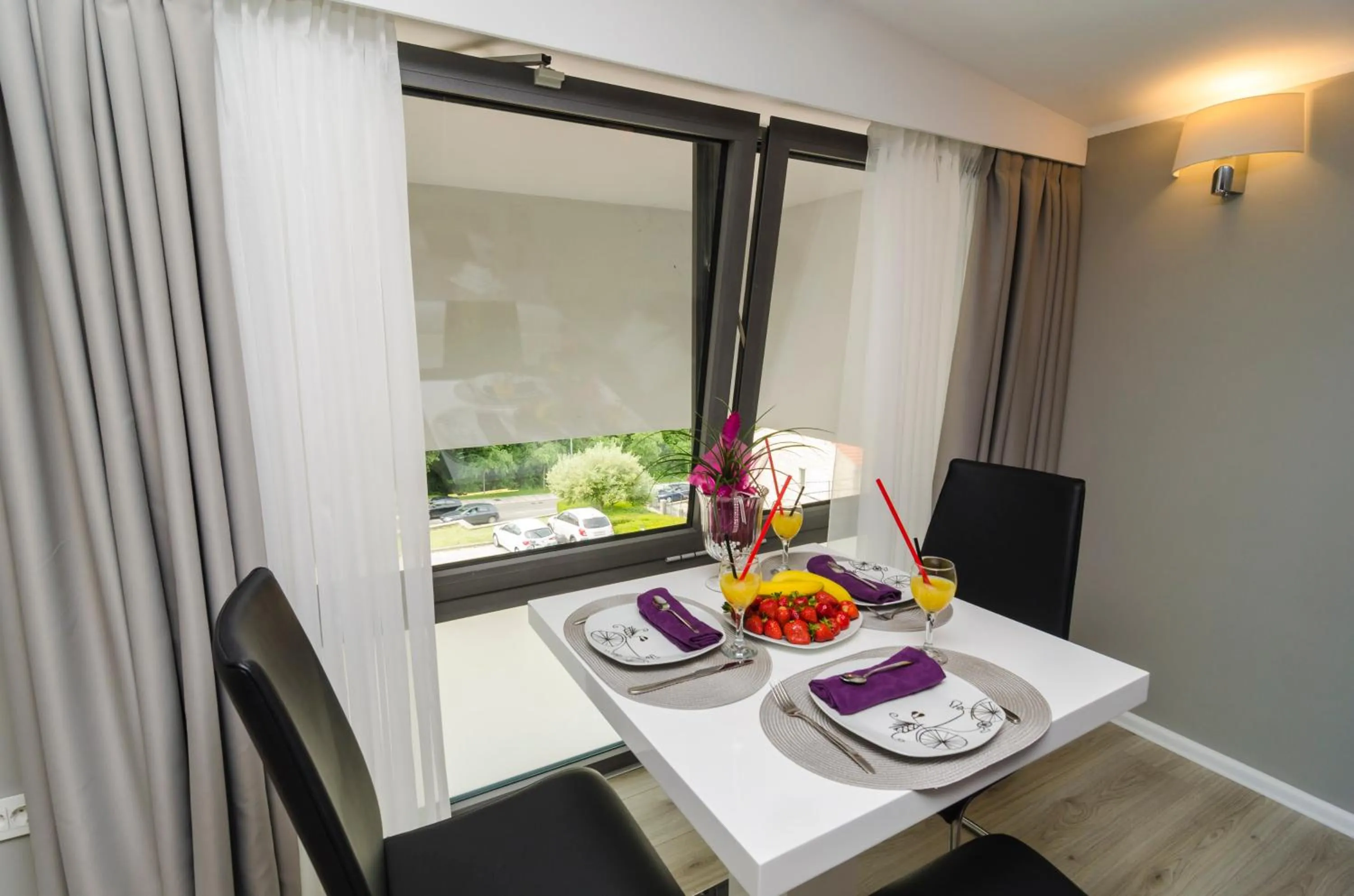 Dining area in Apartments ZoomZoom