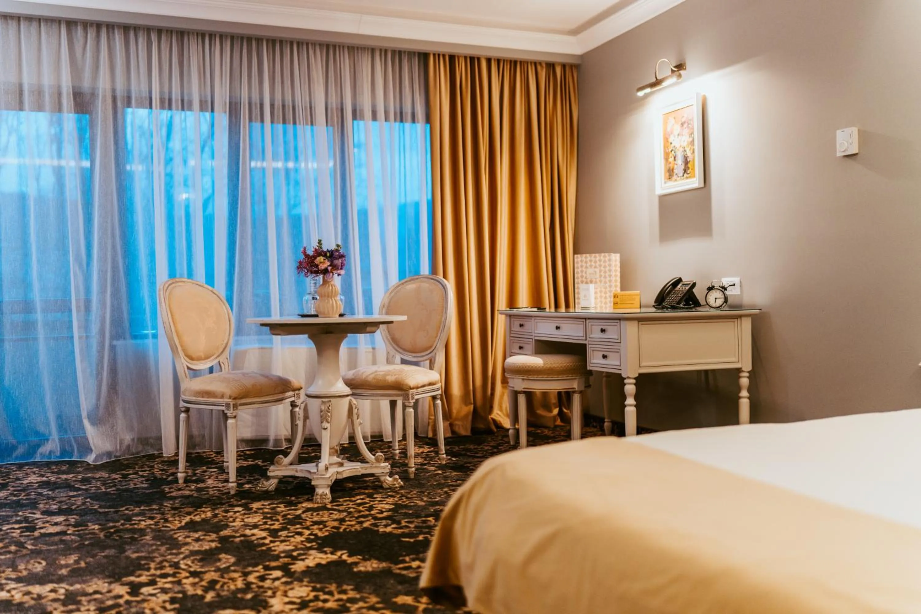 Seating area, Bed in SunGarden Golf & Spa Resort