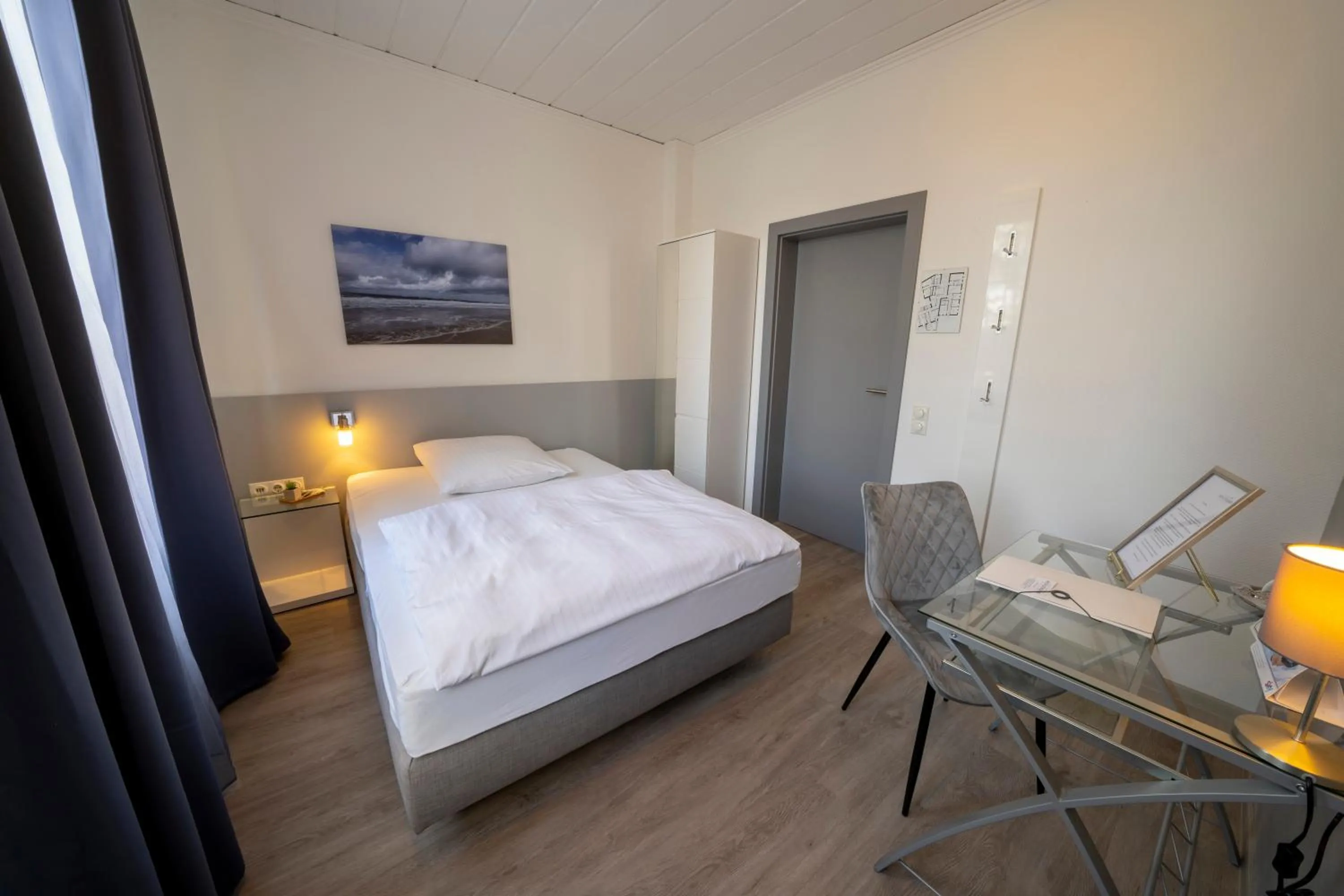 Photo of the whole room, Bed in Mühlenkamp Hotel & Gastronomie