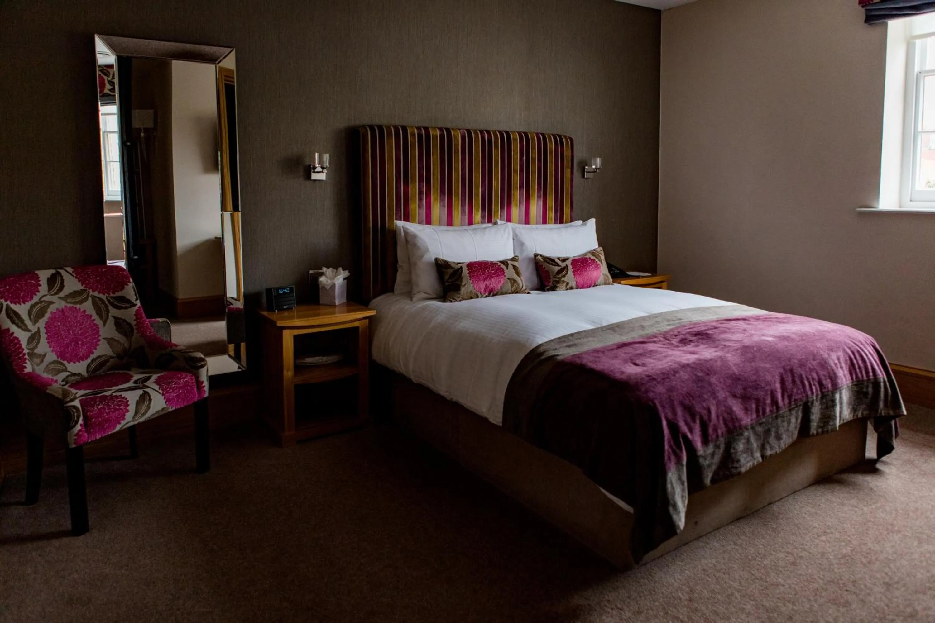 Bed in Ennios Boutique Hotel