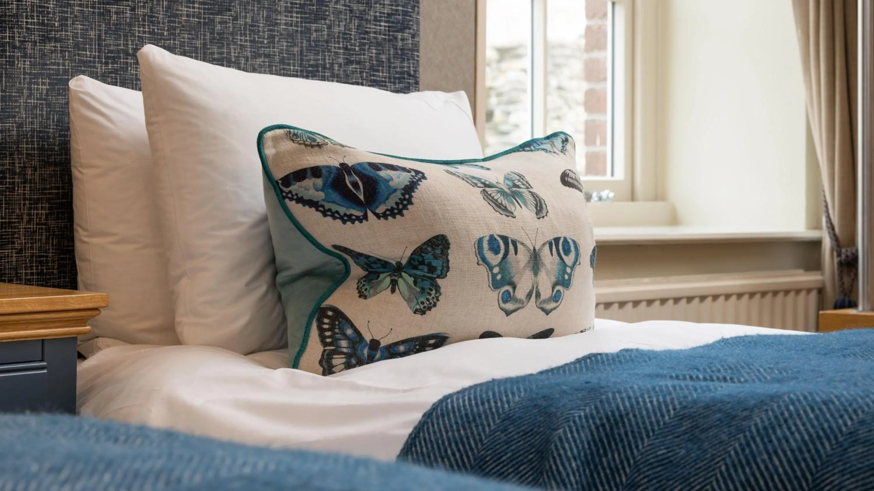 Bed in Ennios Boutique Hotel