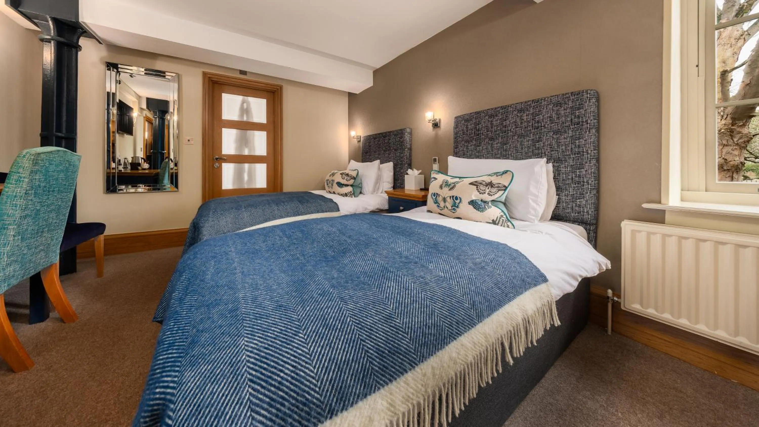 Bed in Ennios Boutique Hotel