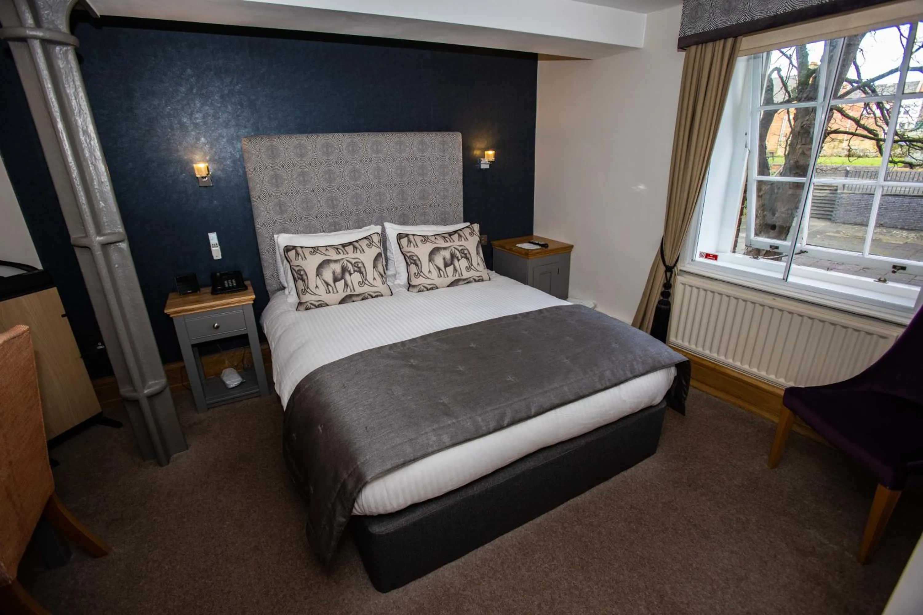 Bed in Ennios Boutique Hotel