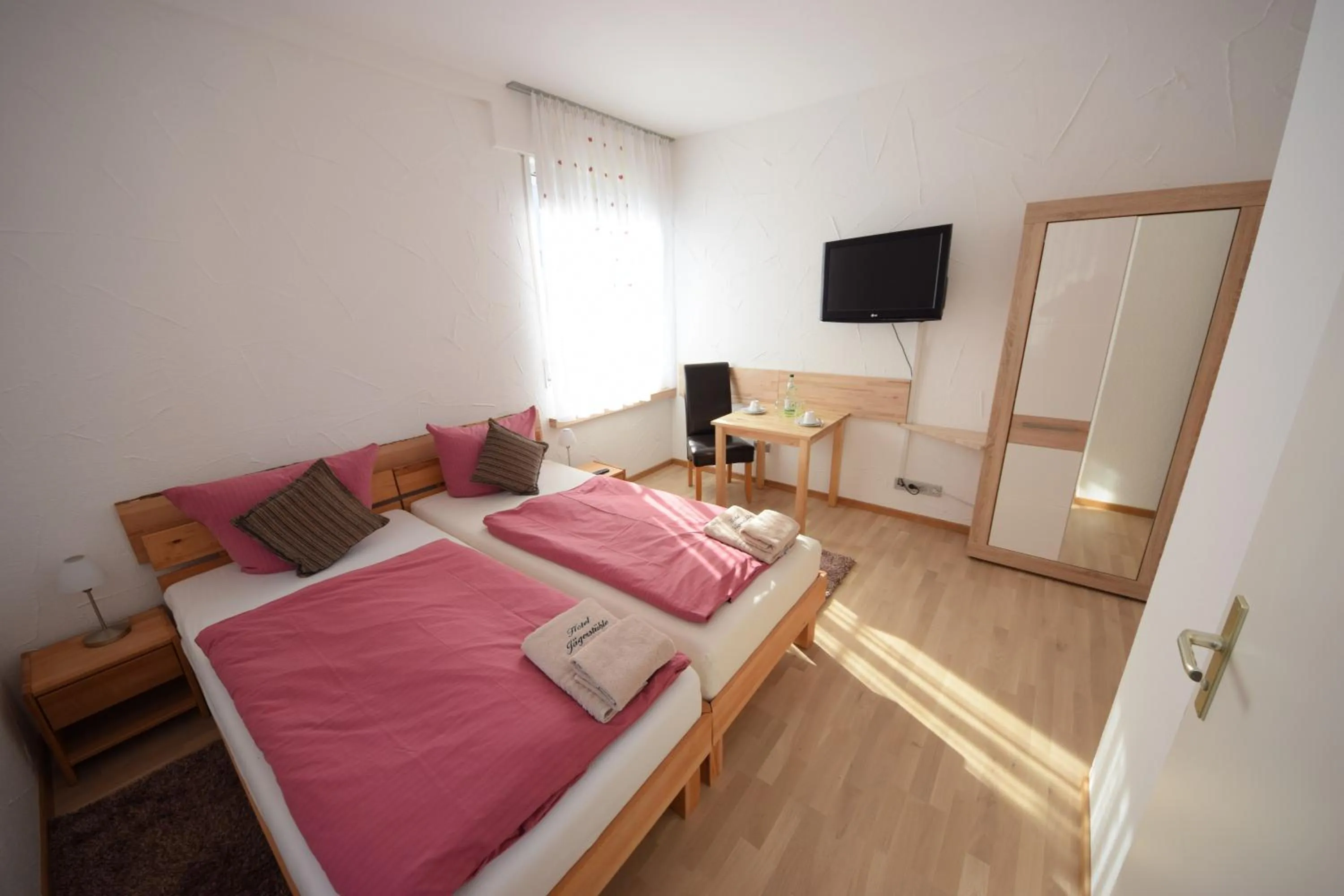 Photo of the whole room, Bed in Gästehaus Jägerstüble