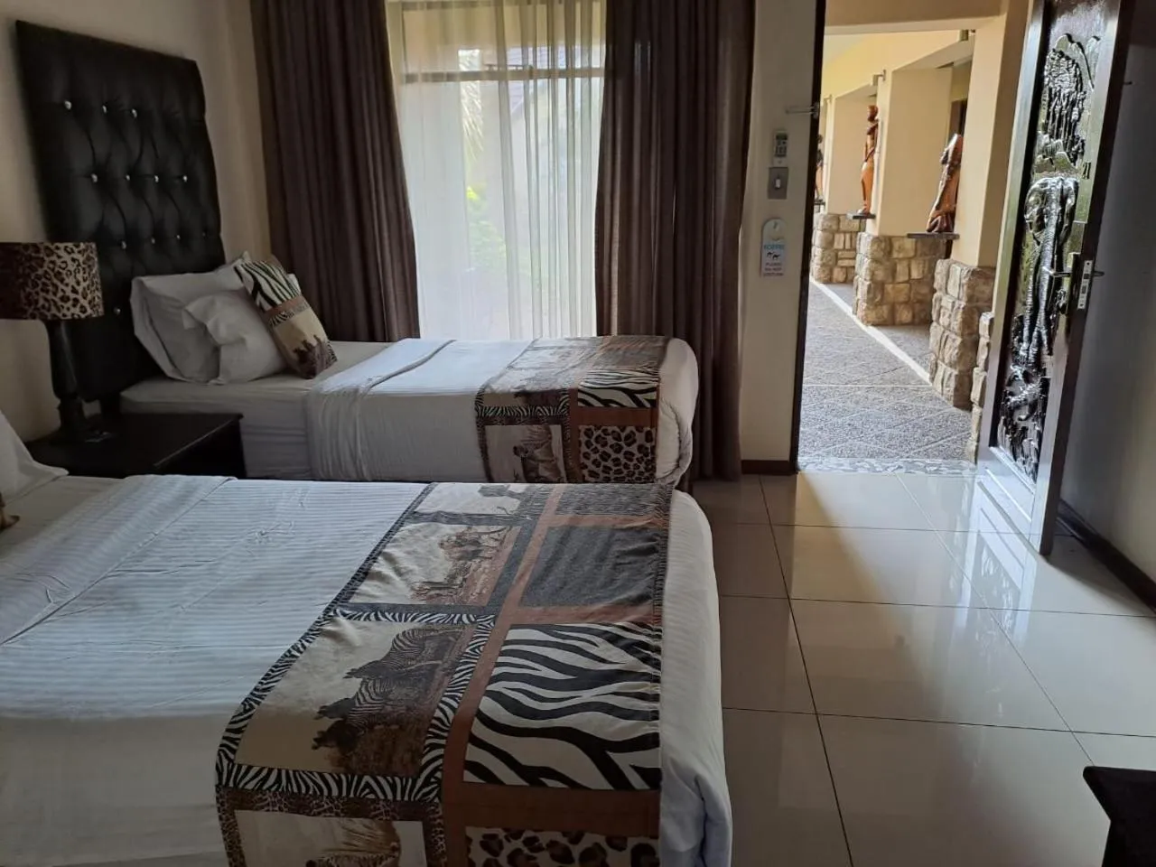 Bed in Ecotel Premier Lodge & Conference Centre