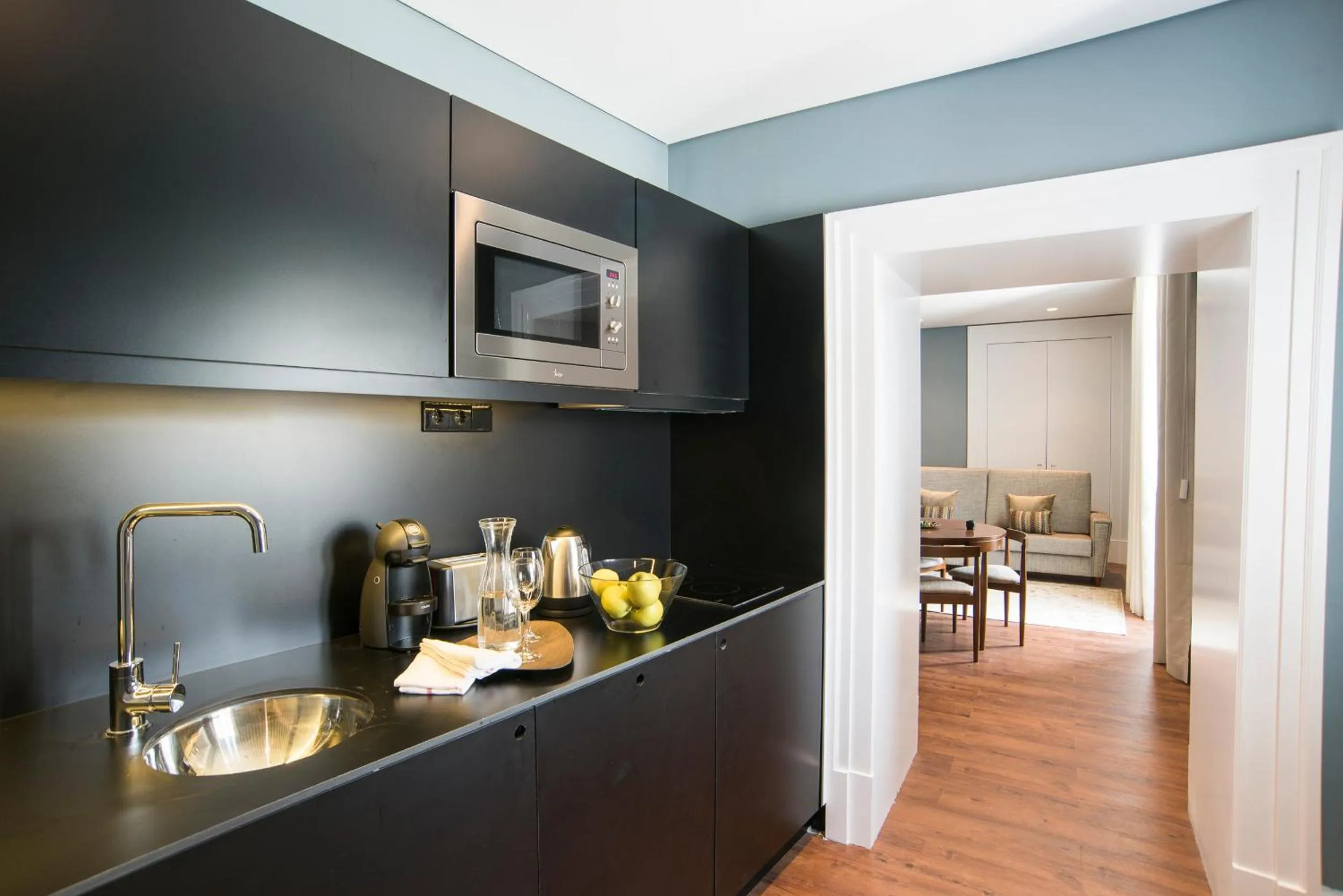 Kitchen or kitchenette in bnapartments Carregal