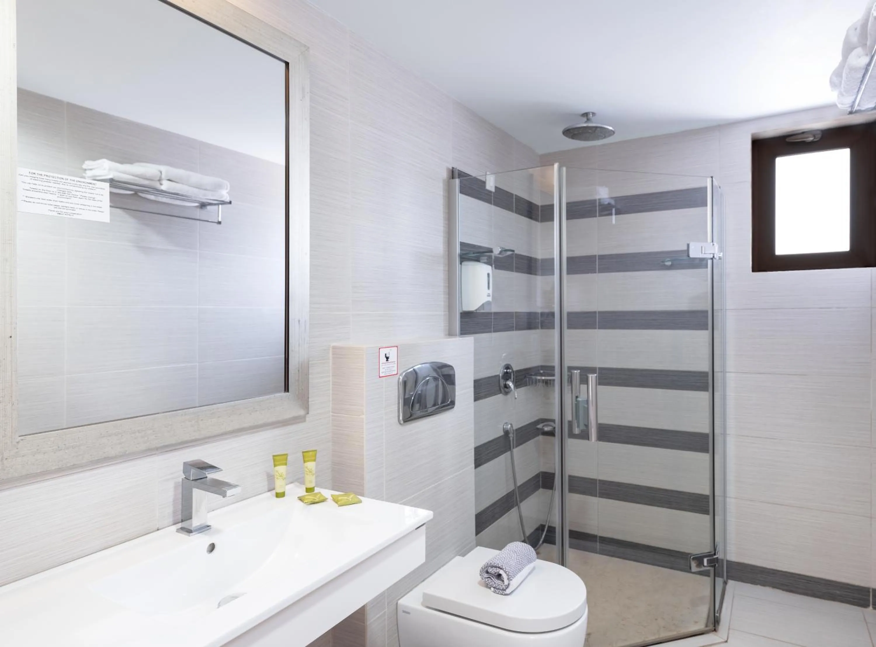 Bathroom in Iolida Beach by Smile Hotels