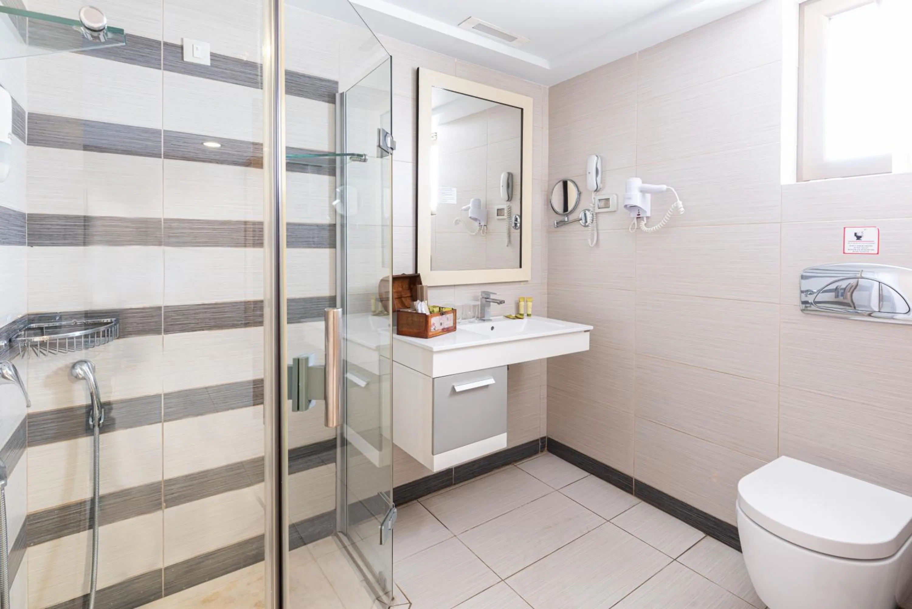 Bathroom in Iolida Beach by Smile Hotels