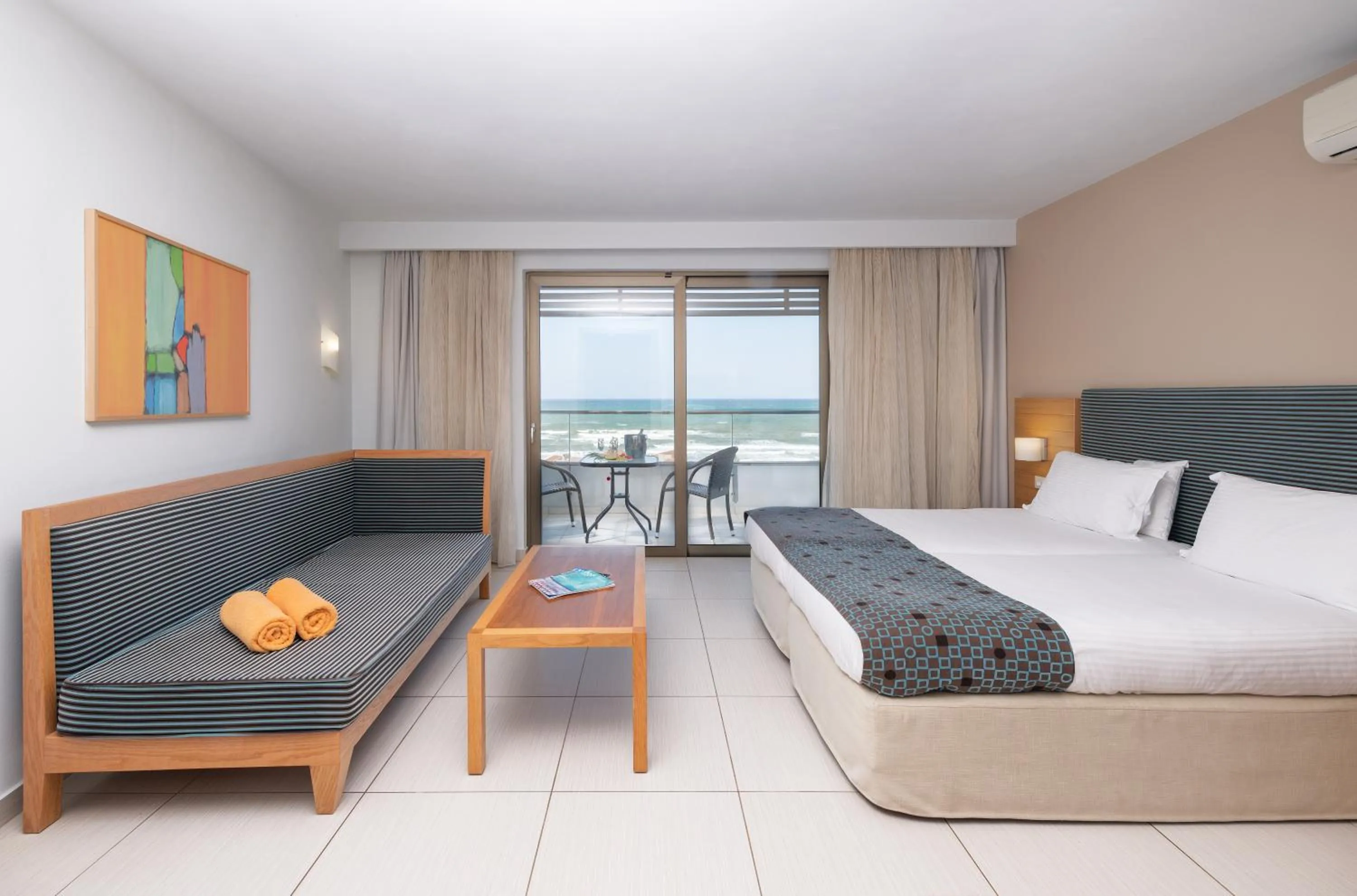 Photo of the whole room, Bed in Iolida Beach by Smile Hotels