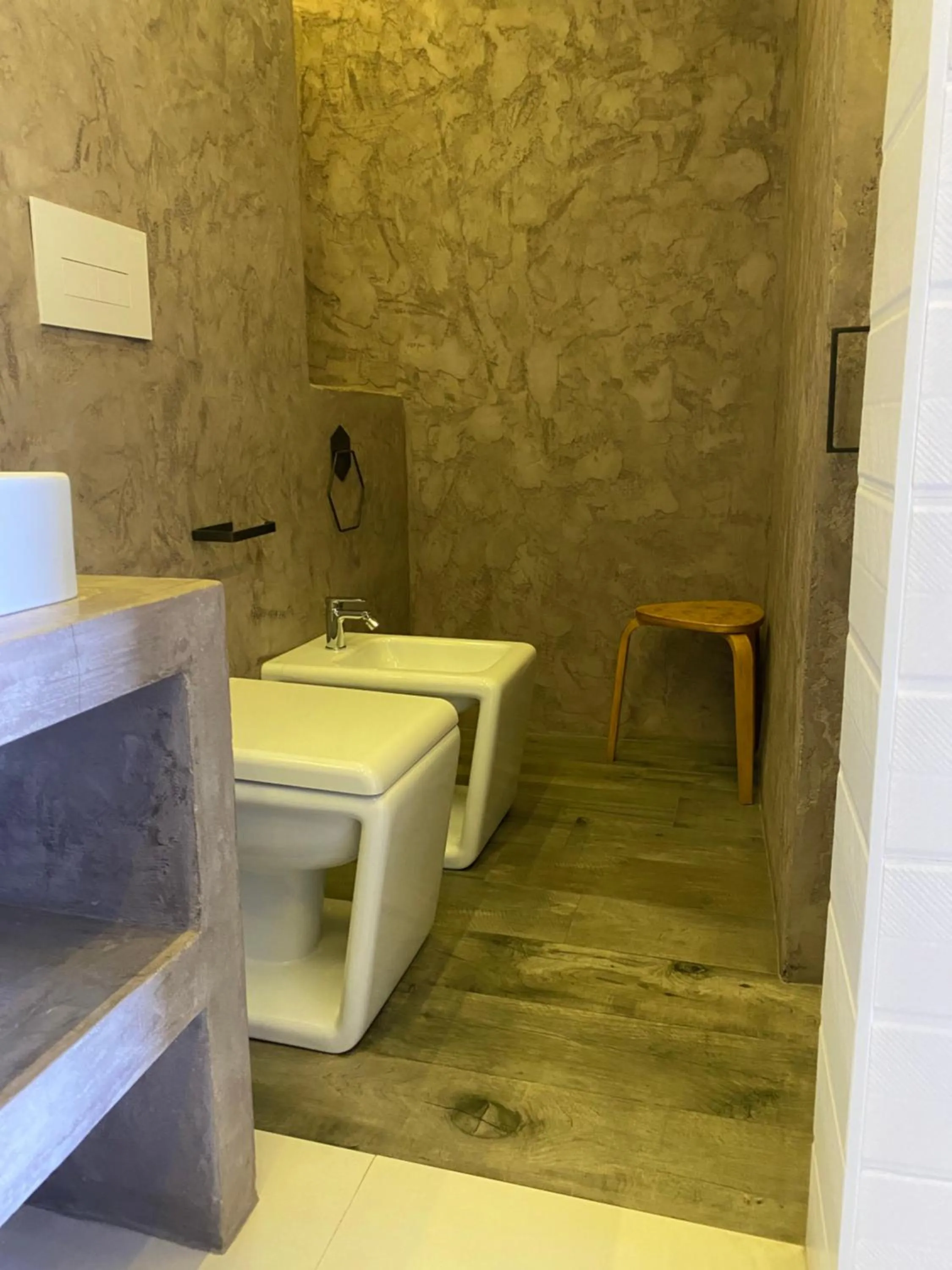 Toilet in Black Market Hotel