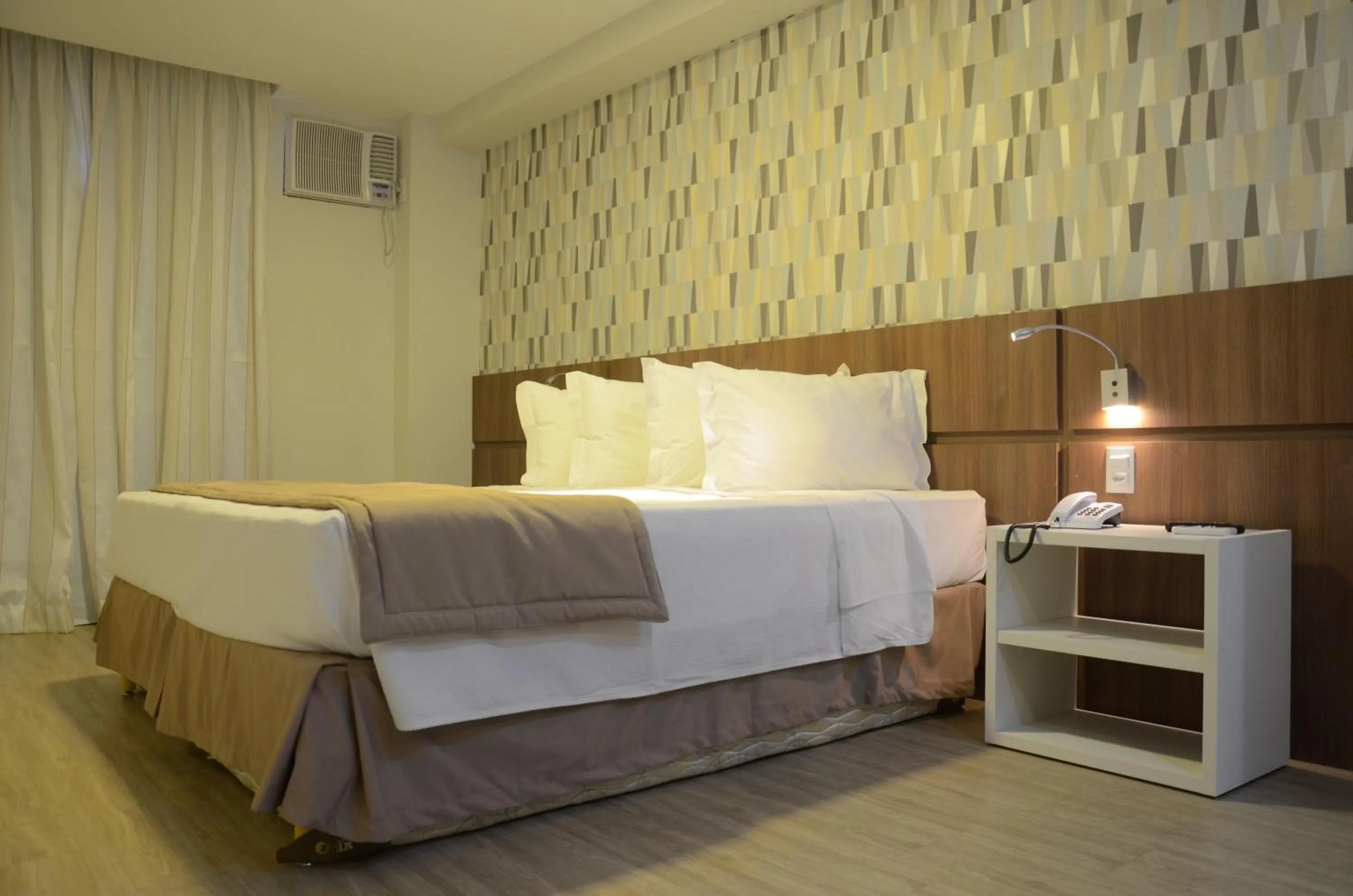 Bed in Casa Nova Hotel