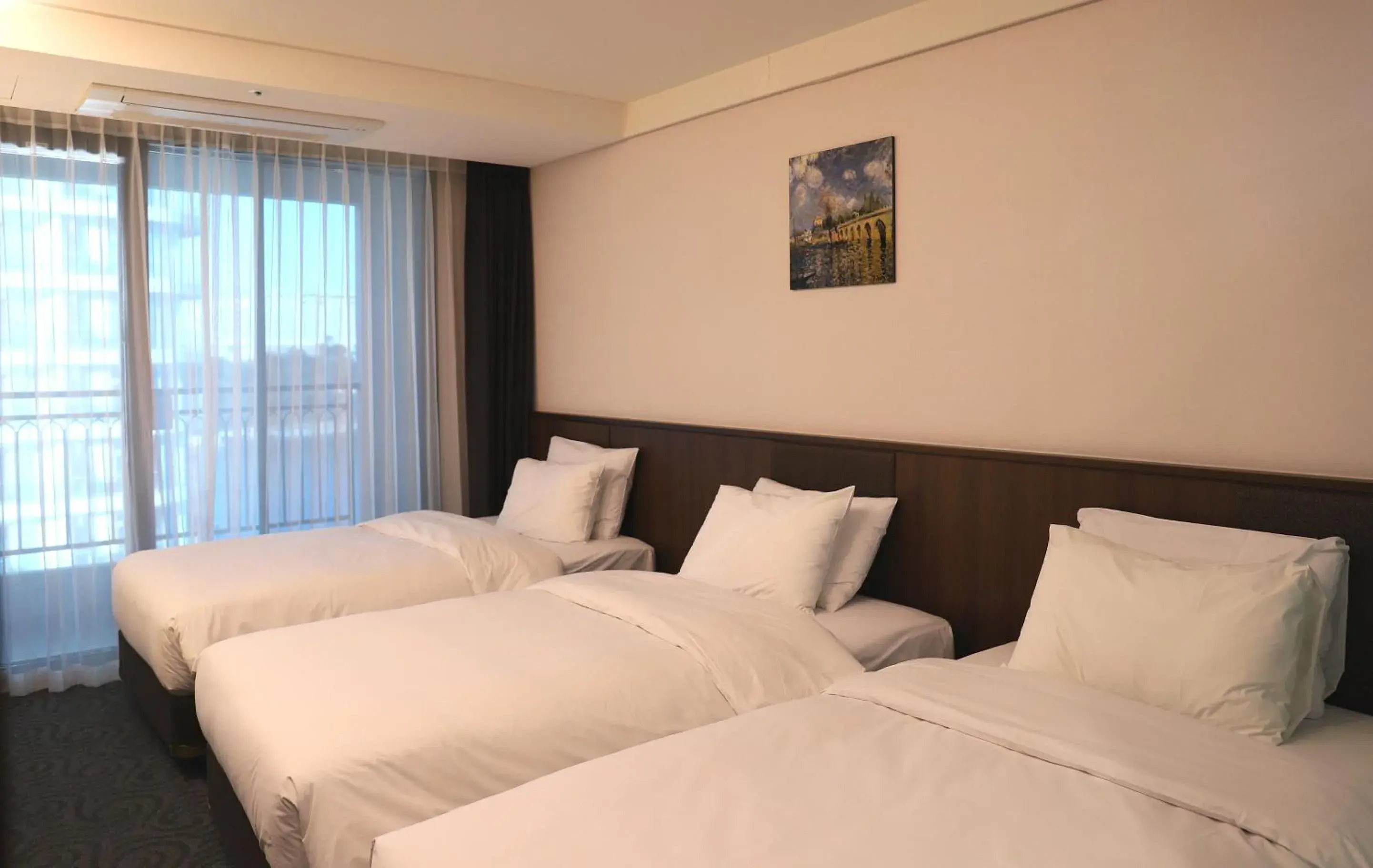 Bed in Ramada by Wyndham Gangwon Sokcho Bed in Ramada by Wyndham Gangwon Sokcho