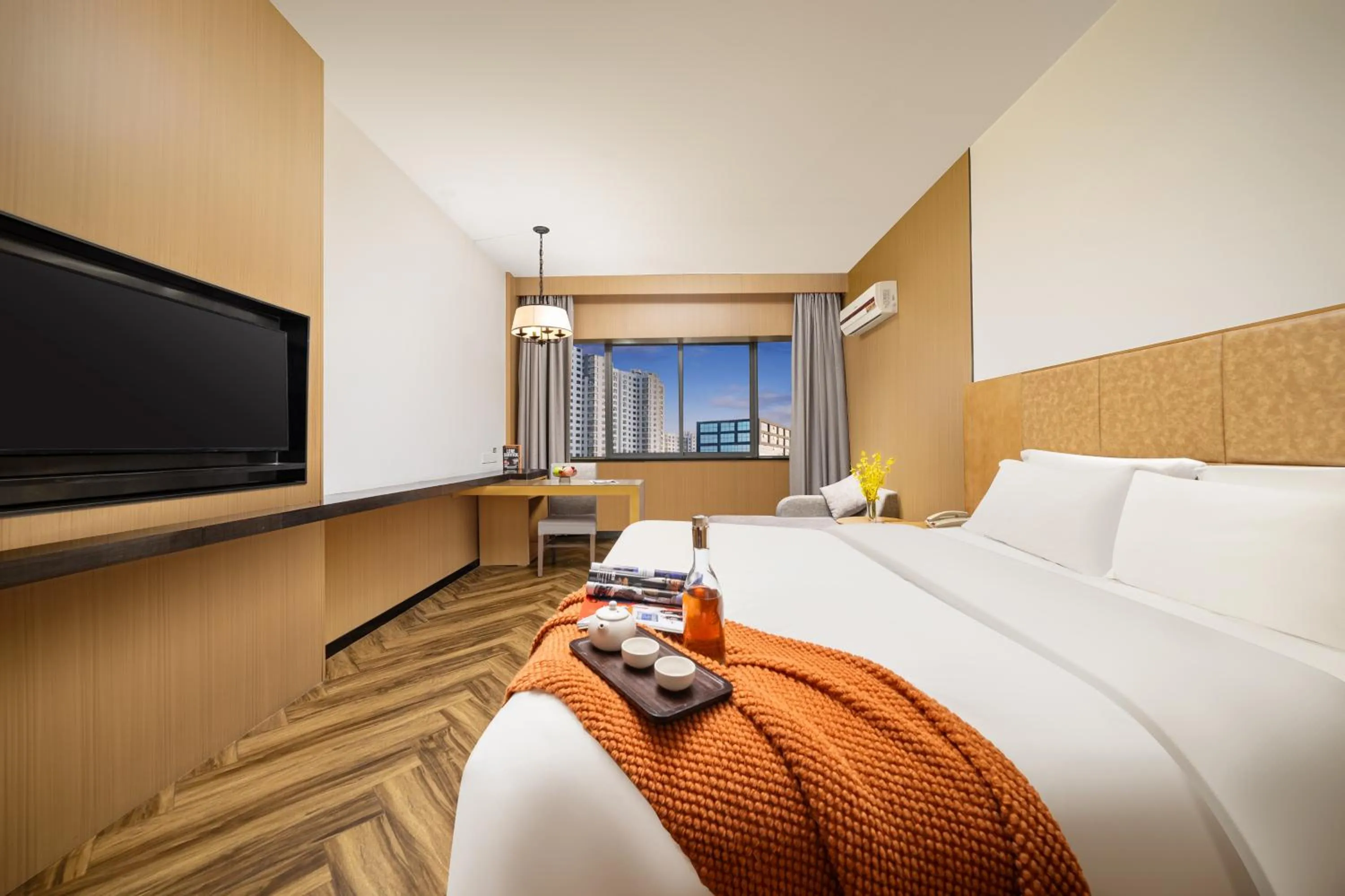 Bed in Mellow Orange Hotel