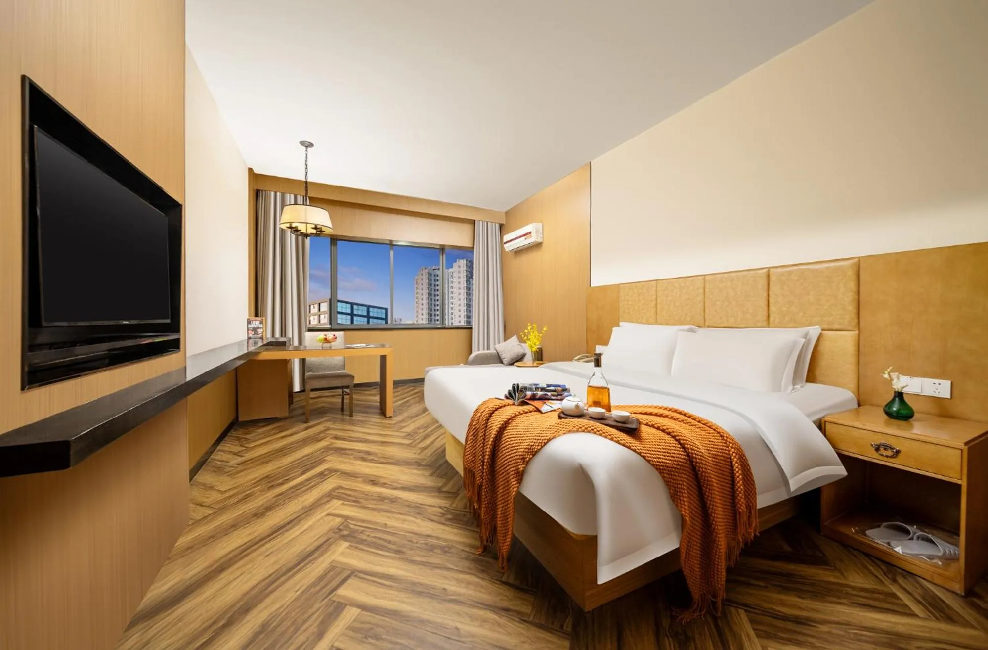 Bed in Mellow Orange Hotel