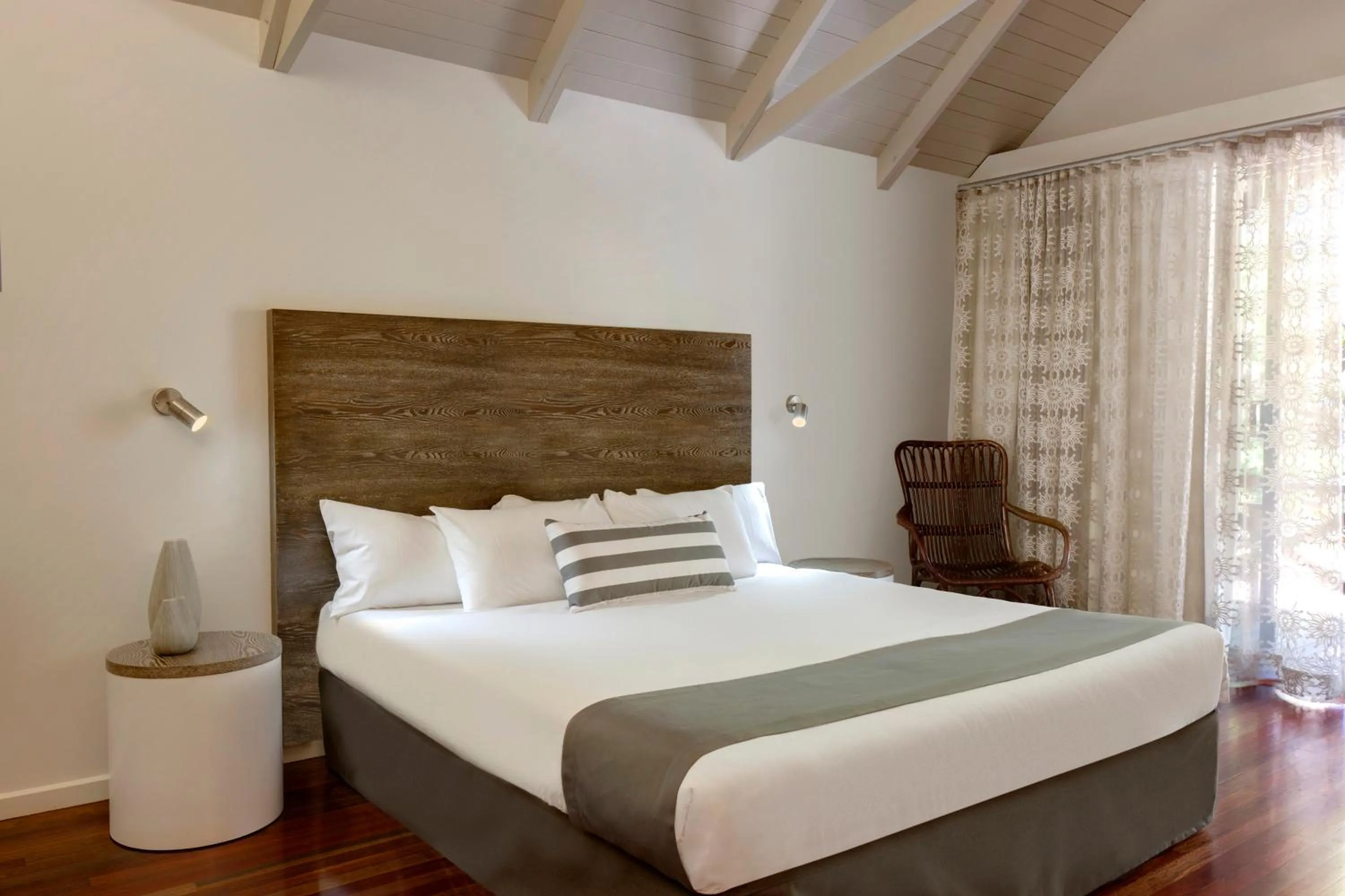 Bed in Palm Bungalows