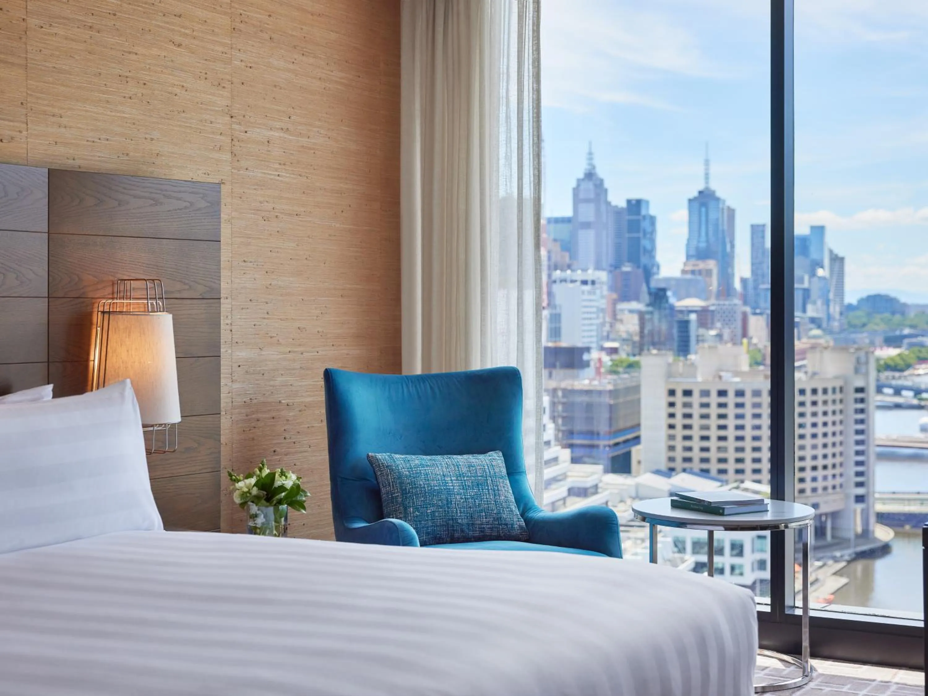 Seating area, Bed in Pan Pacific Melbourne