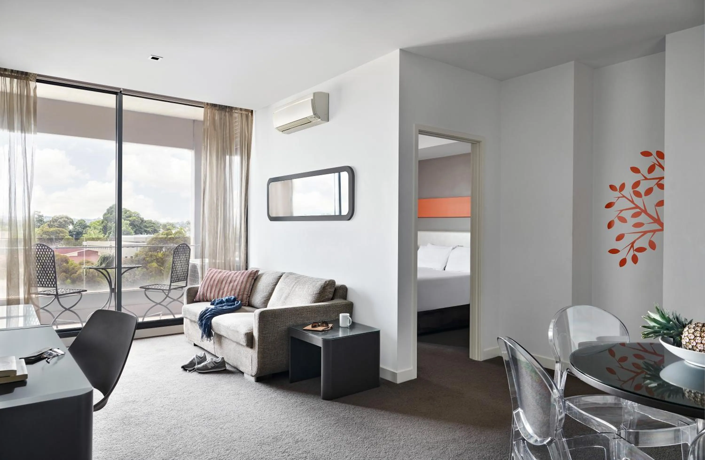 Living room, Bed in Dandenong Central Apartments Official