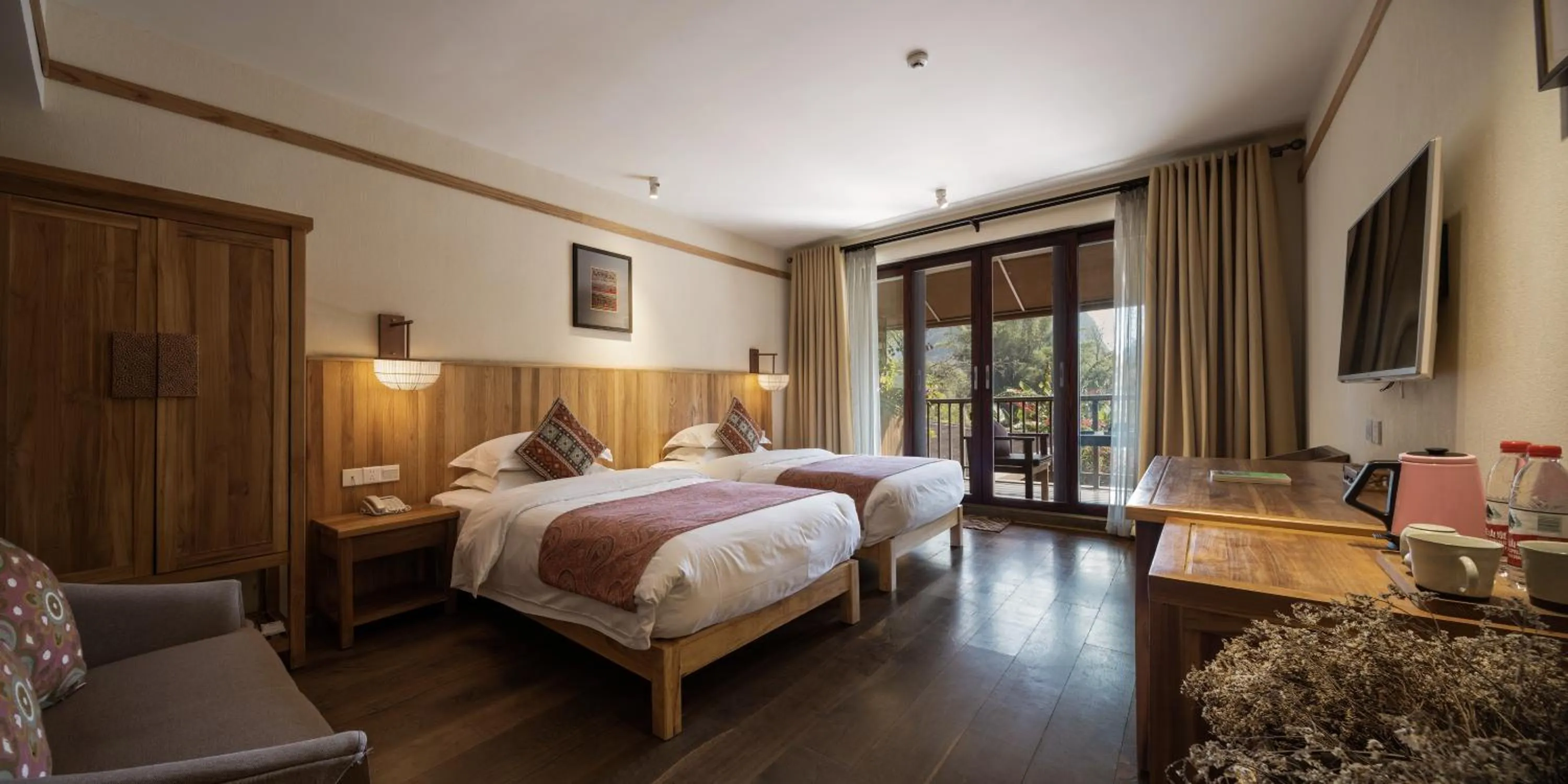 Bed in Yangshuo The Apsara Lodge