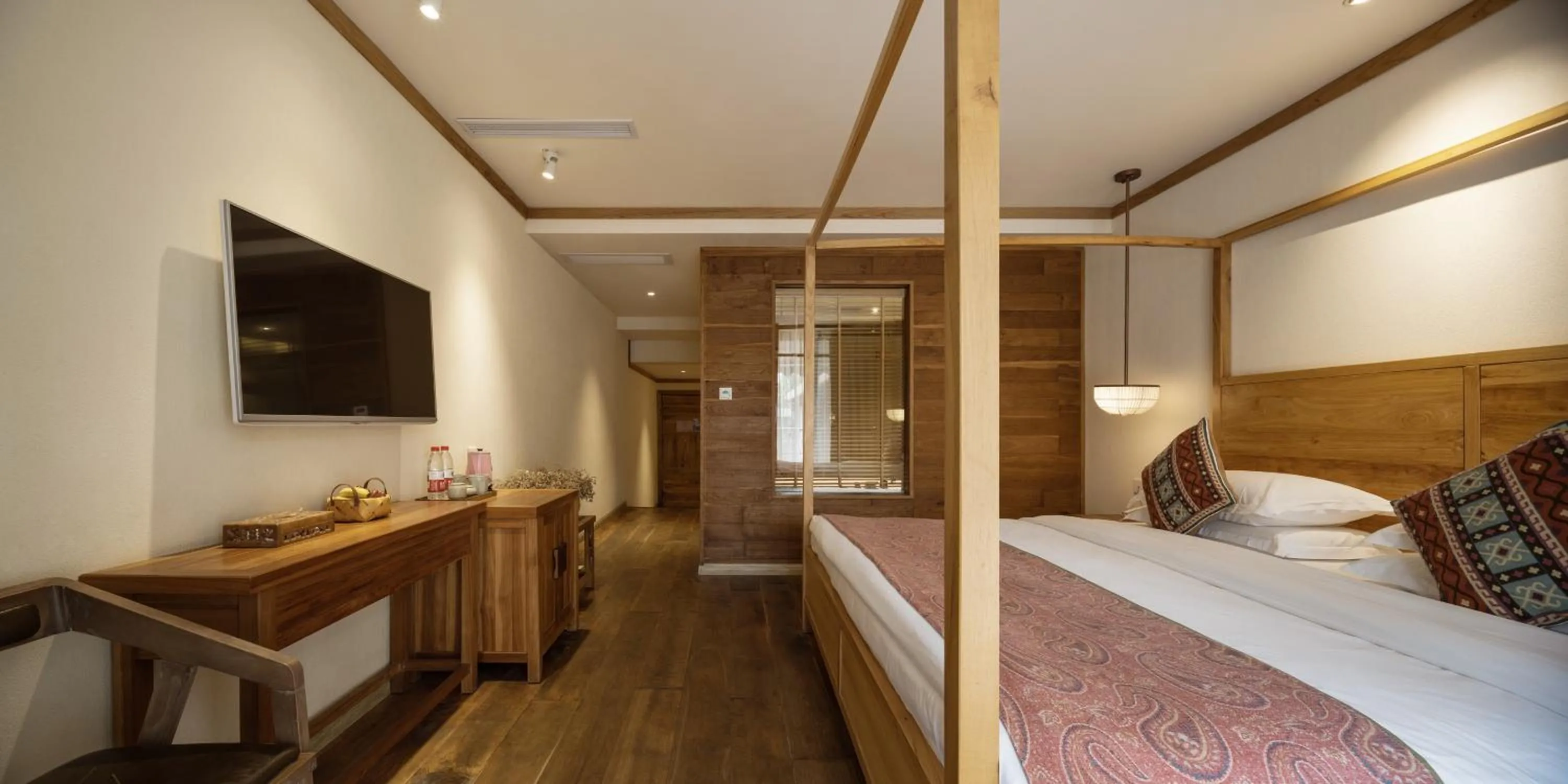 Bed in Yangshuo The Apsara Lodge