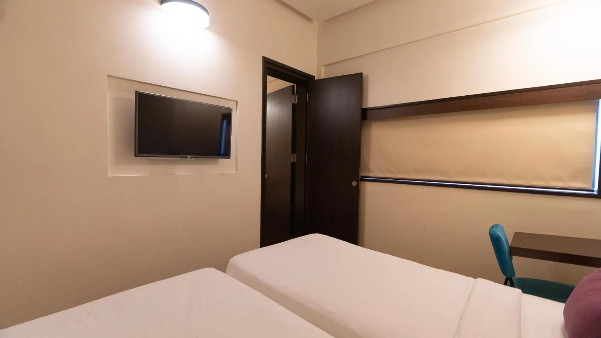 Bed in 7 Apple Hotel Aurangabad