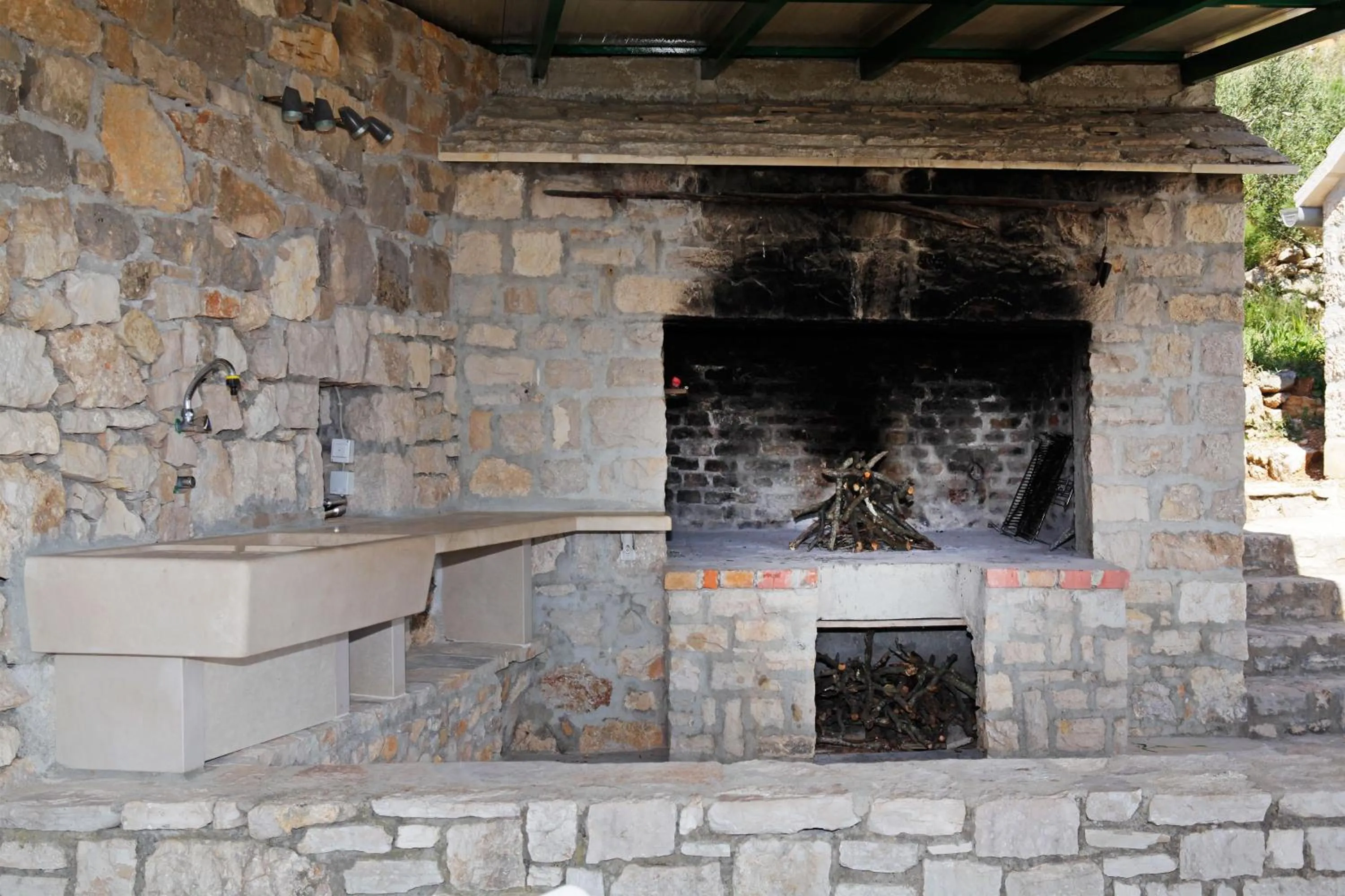 BBQ facilities in Holiday home Nina