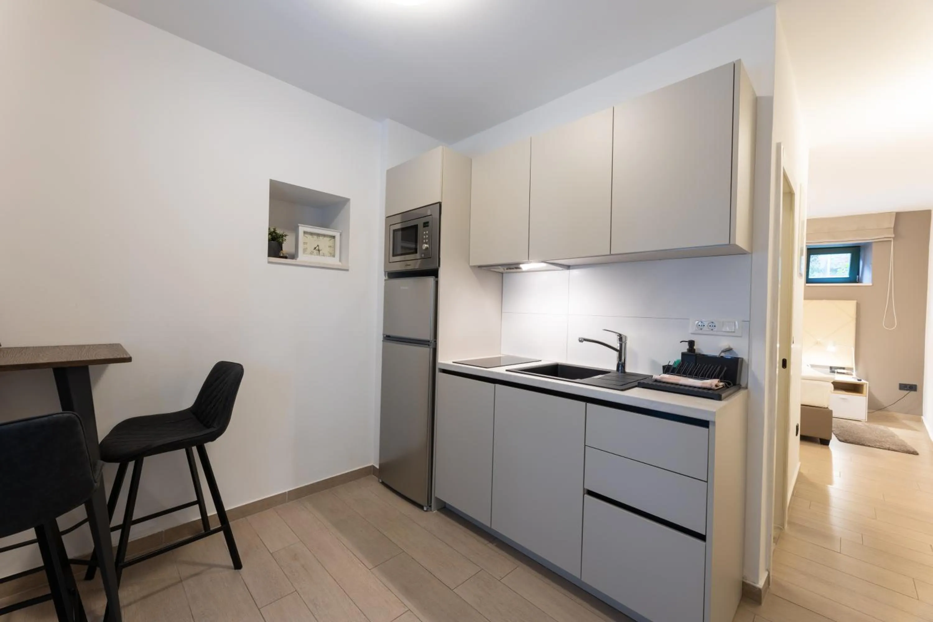 Kitchen or kitchenette in Apartments Korta