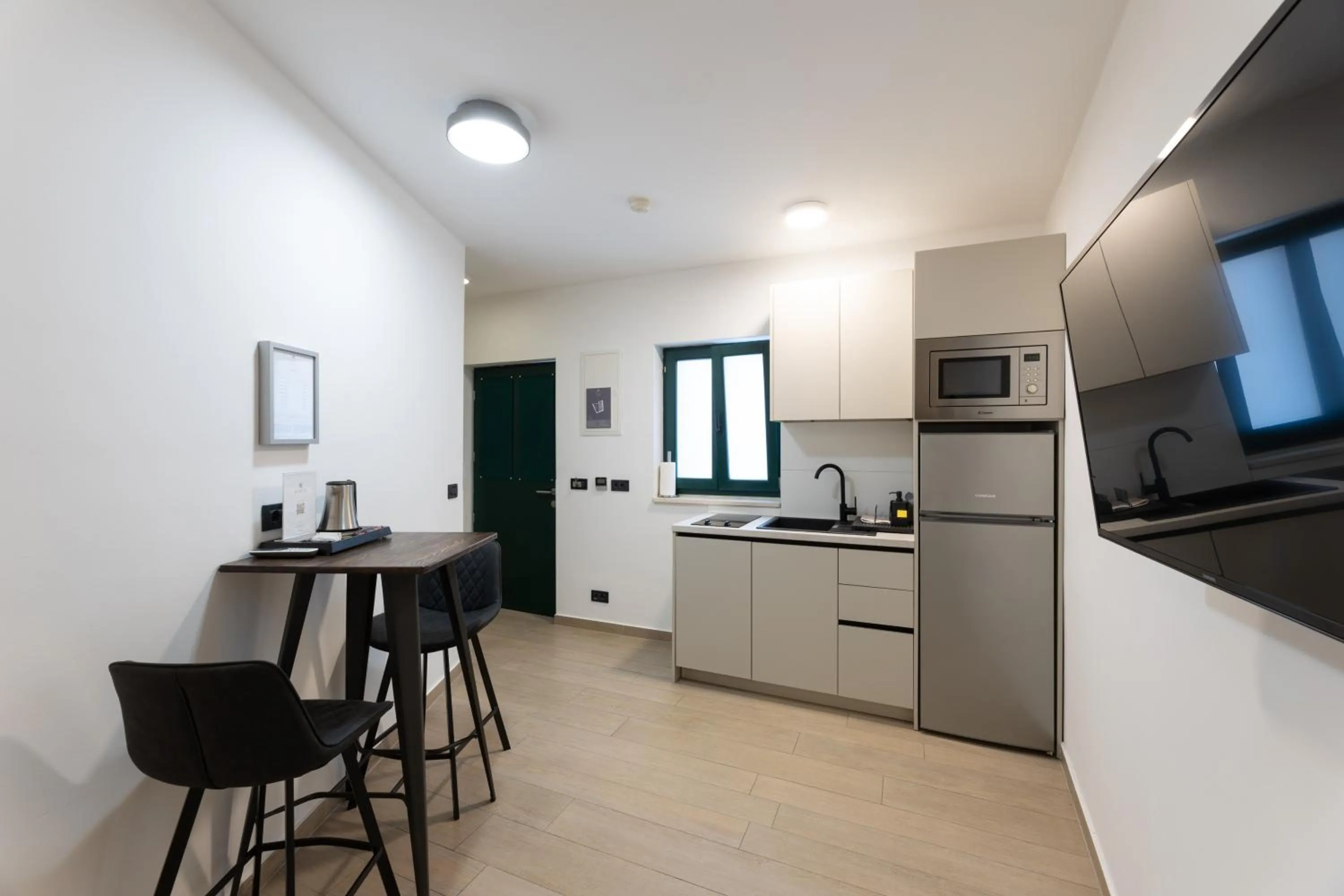 Kitchen or kitchenette in Apartments Korta