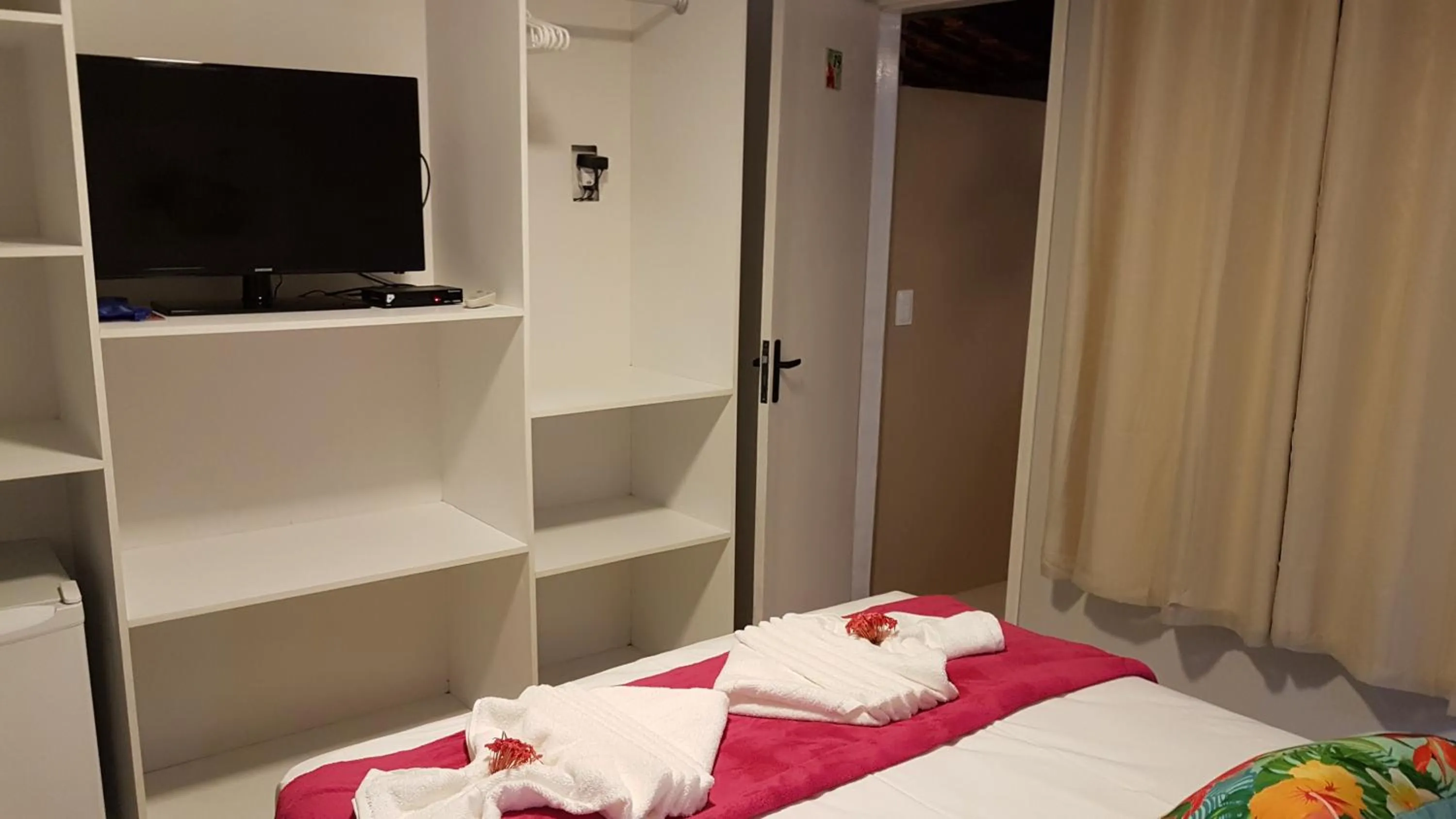 Bed in Pousada das Bromélias