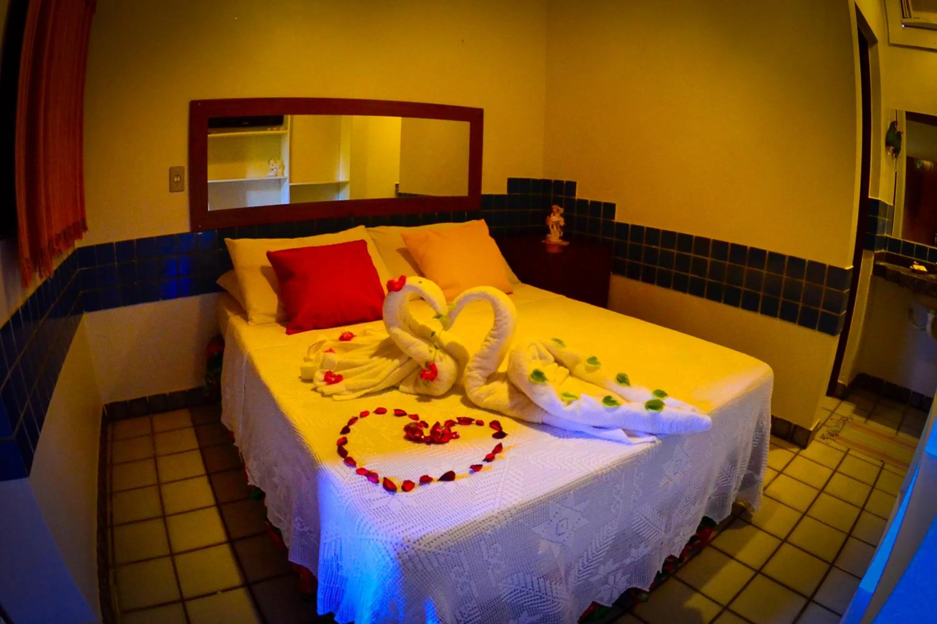 Bed in Pousada das Bromélias