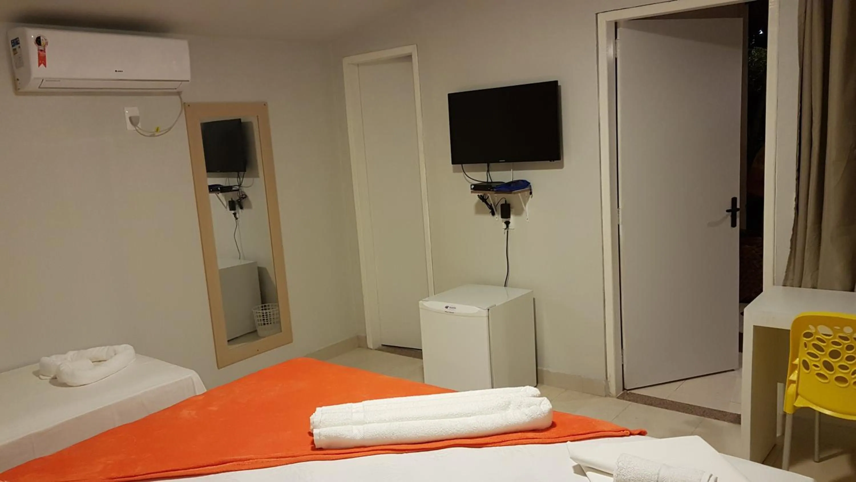 Bed in Pousada das Bromélias