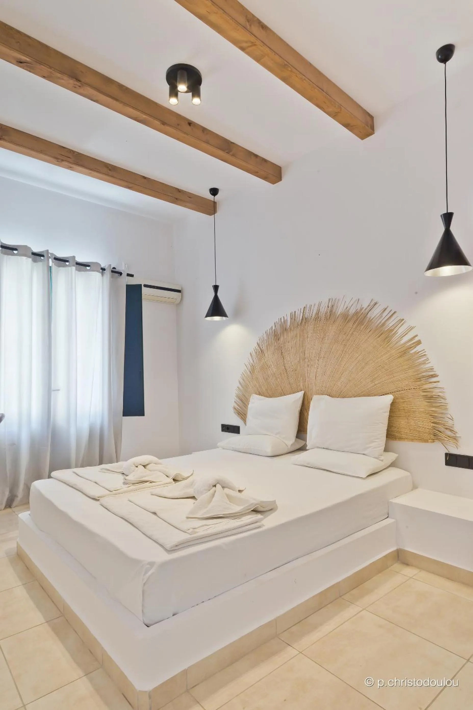Bed in Kyra Panagia Hotel