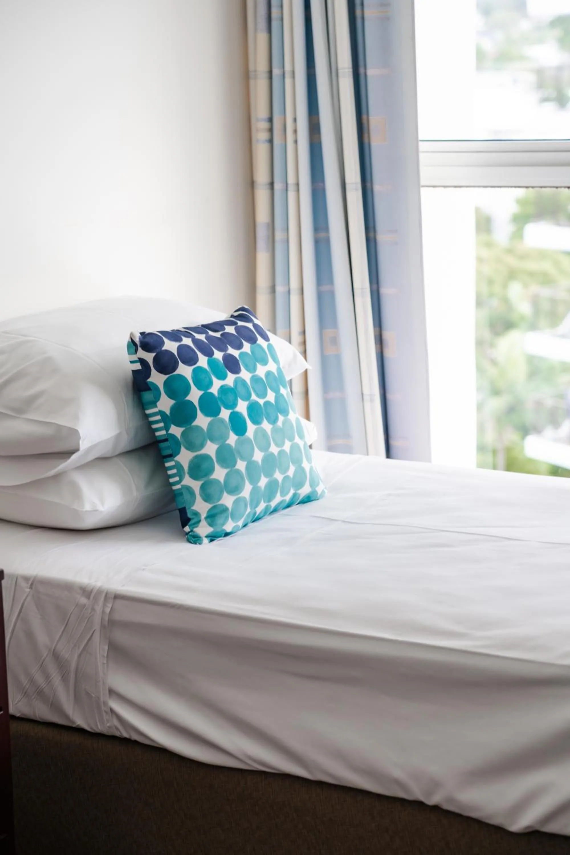 Bed in Cashelmara Beachfront Apartments