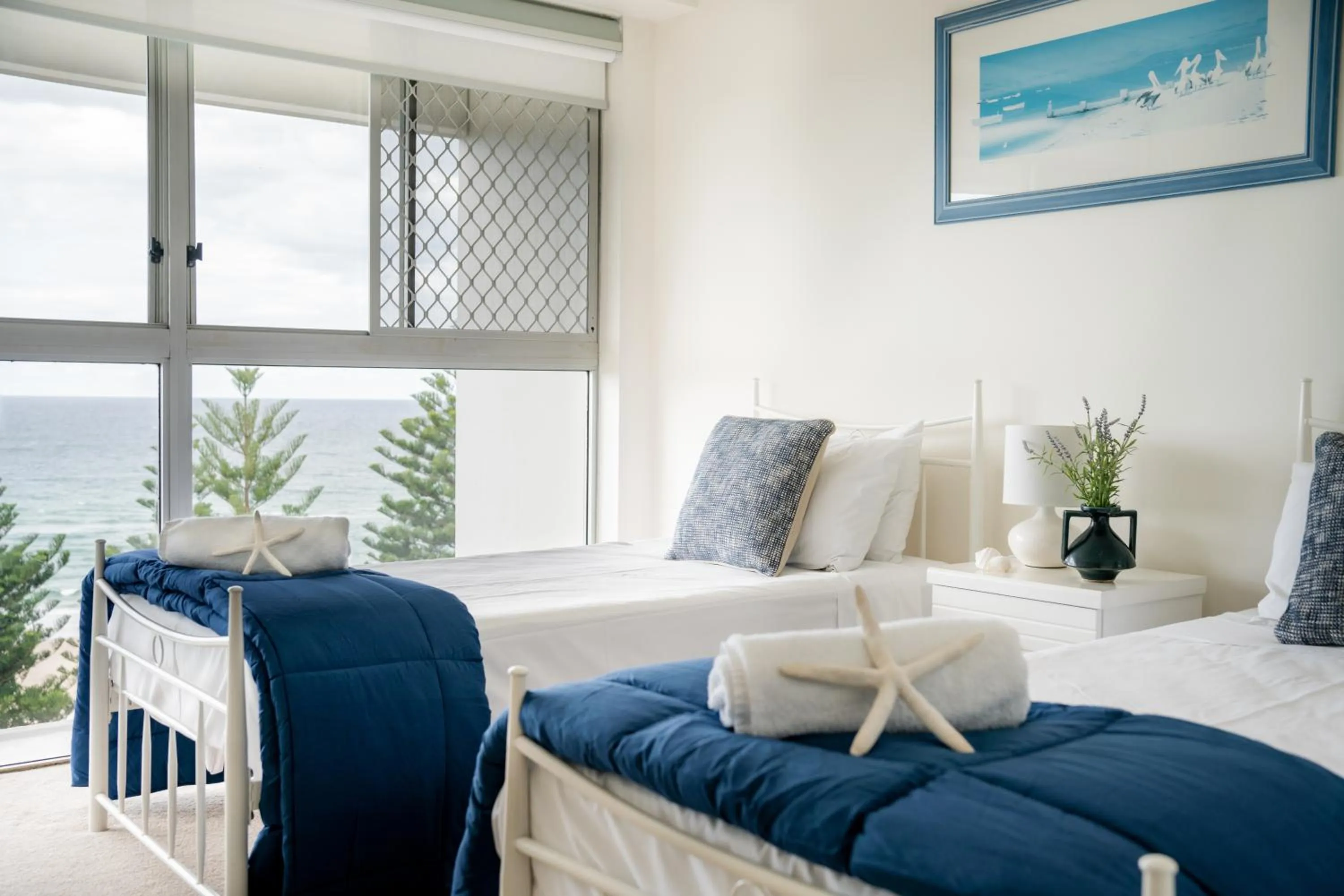 Bed in Cashelmara Beachfront Apartments
