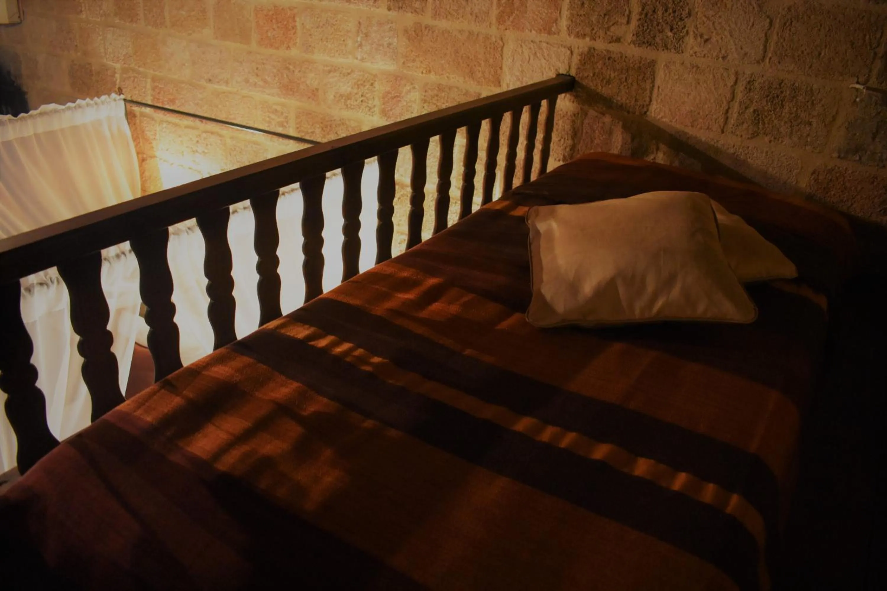 Decorative detail, Bed in S.Nikolis' Historic Boutique Hotel