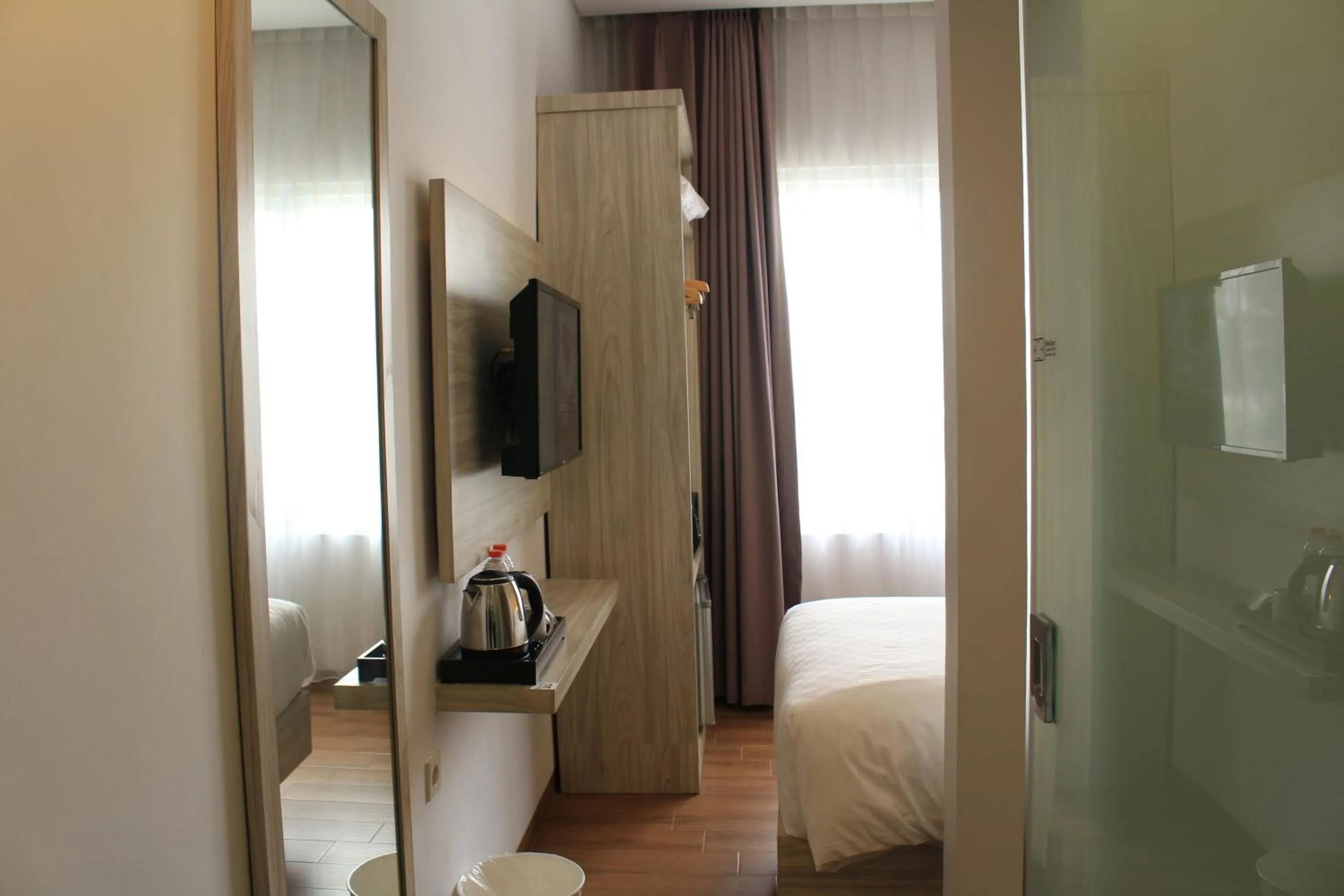 Bedroom, Bed in Front One Akshaya Hotel Karawang