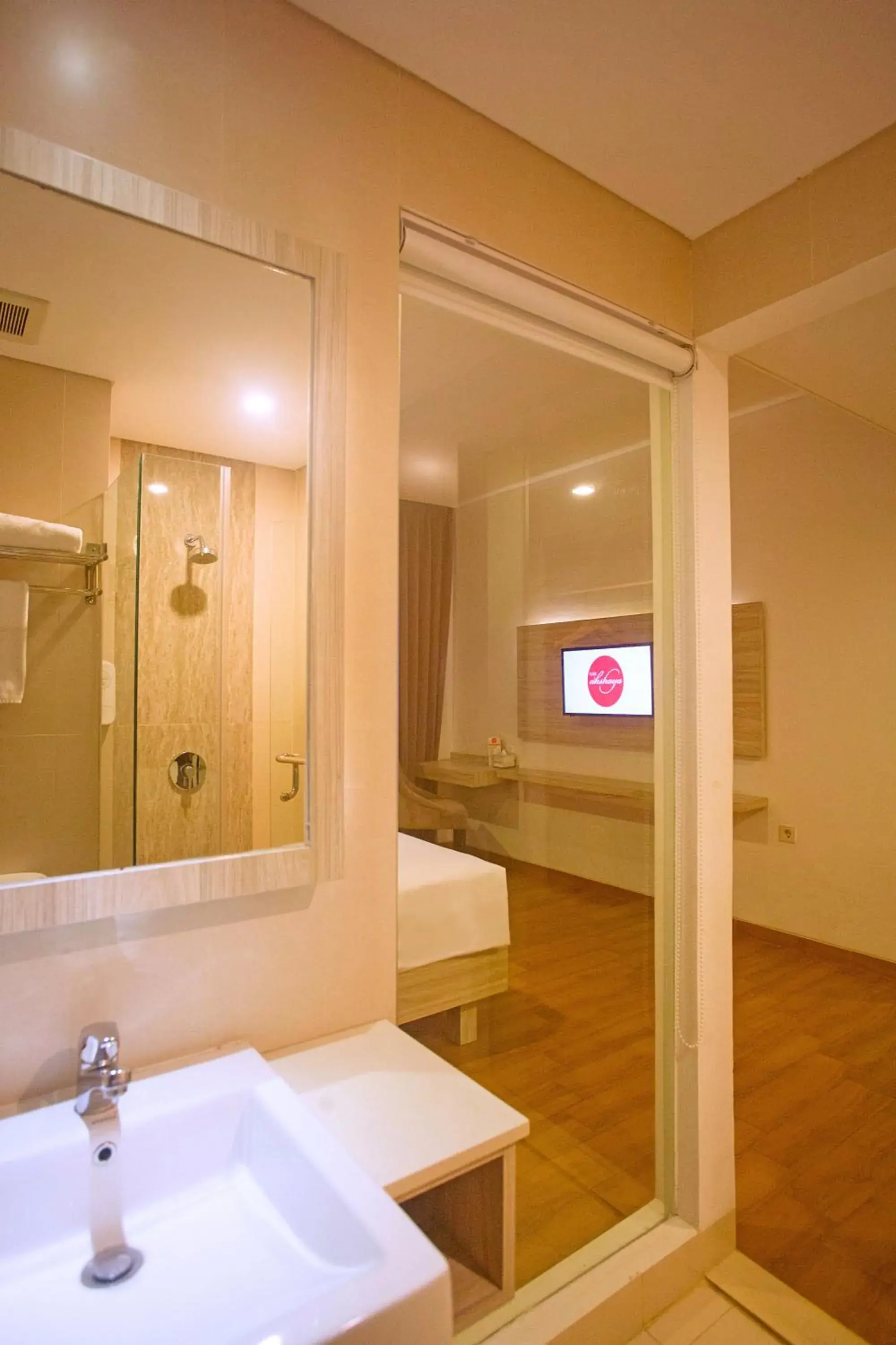 Bathroom, Bed in Front One Akshaya Hotel Karawang Bathroom, Bed in Front One Akshaya Hotel Karawang