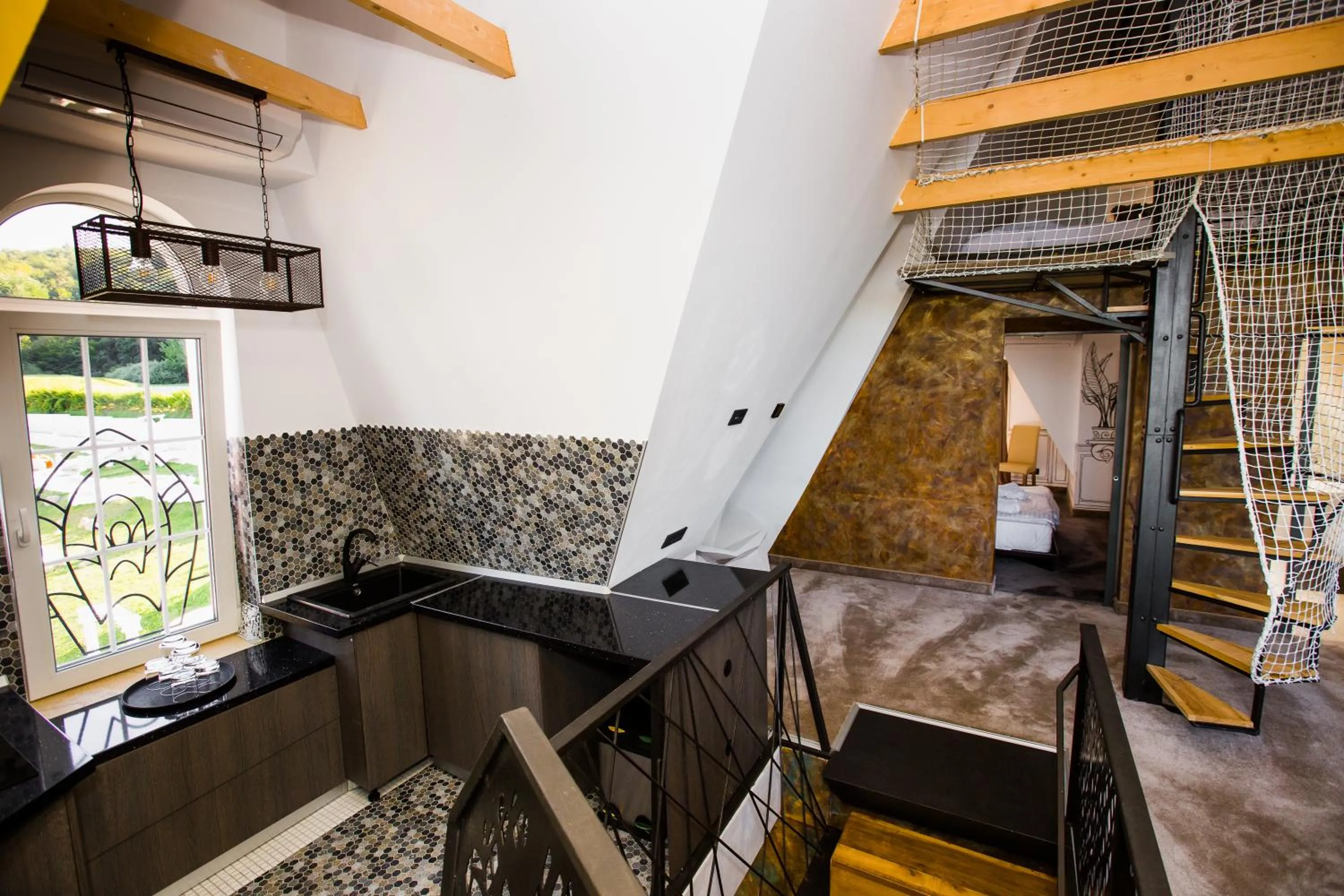 Kitchen or kitchenette in Wonderland Cluj Resort