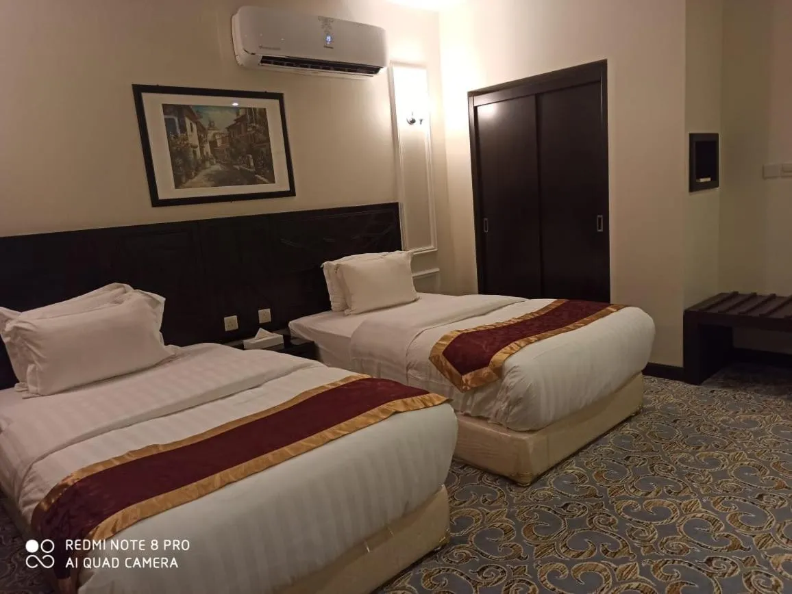 Bed in Rollins Hotel