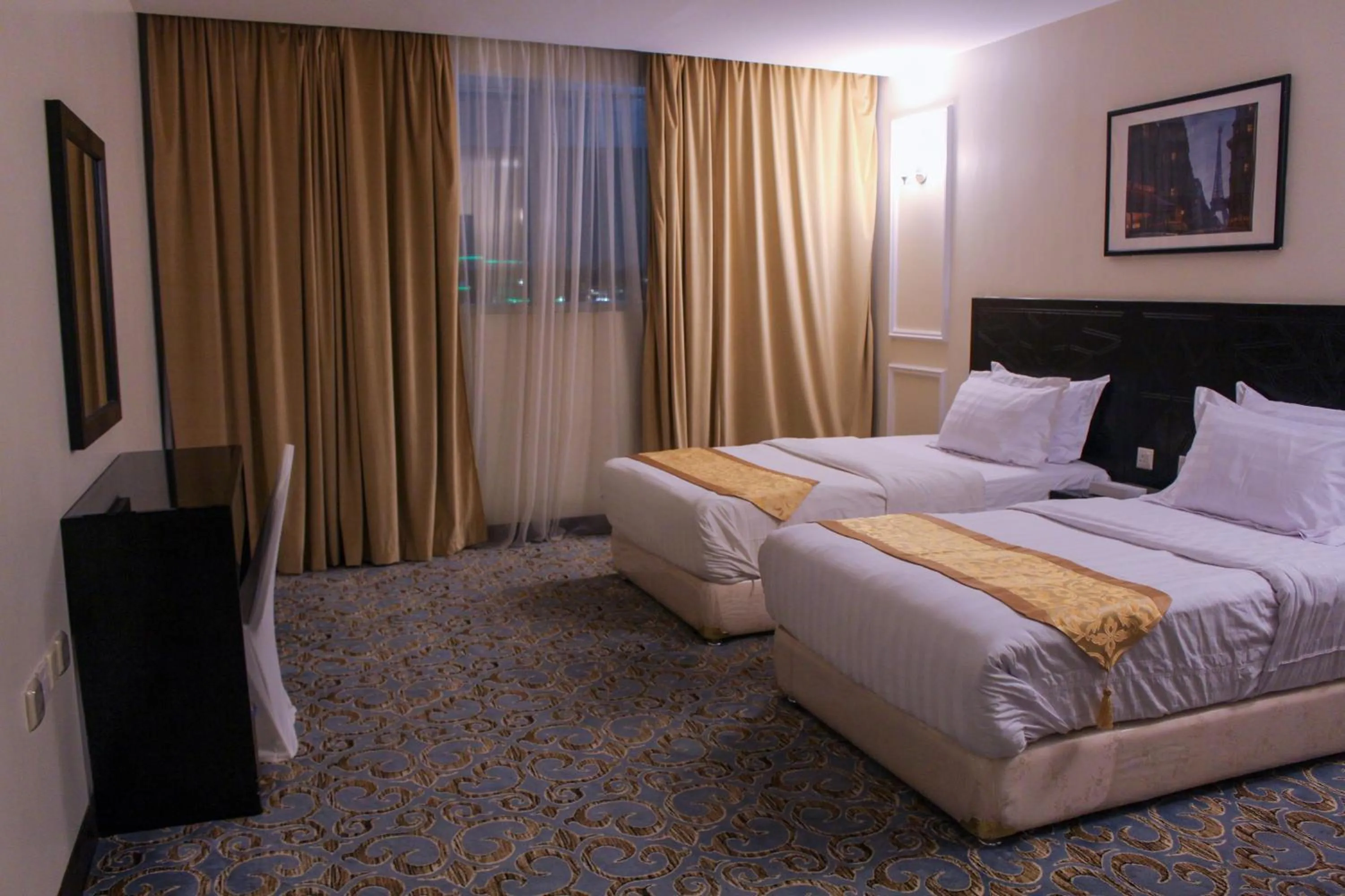 Bed in Rollins Hotel