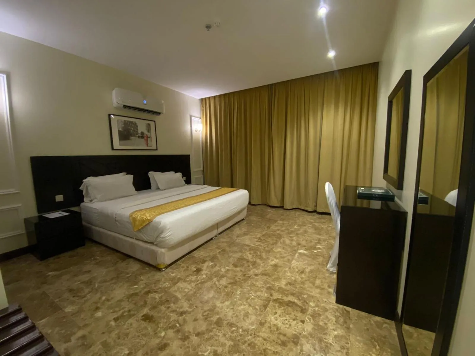 Bed in Rollins Hotel