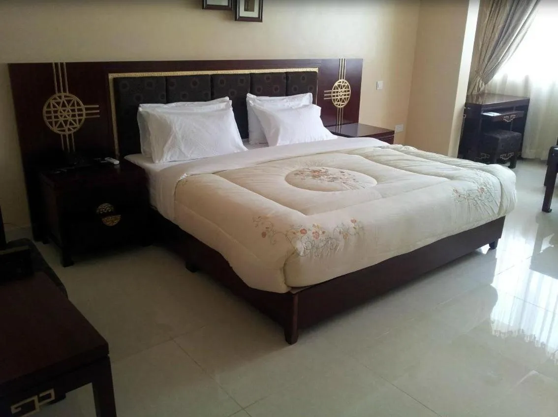 Bed in Imperial Golf View Hotel