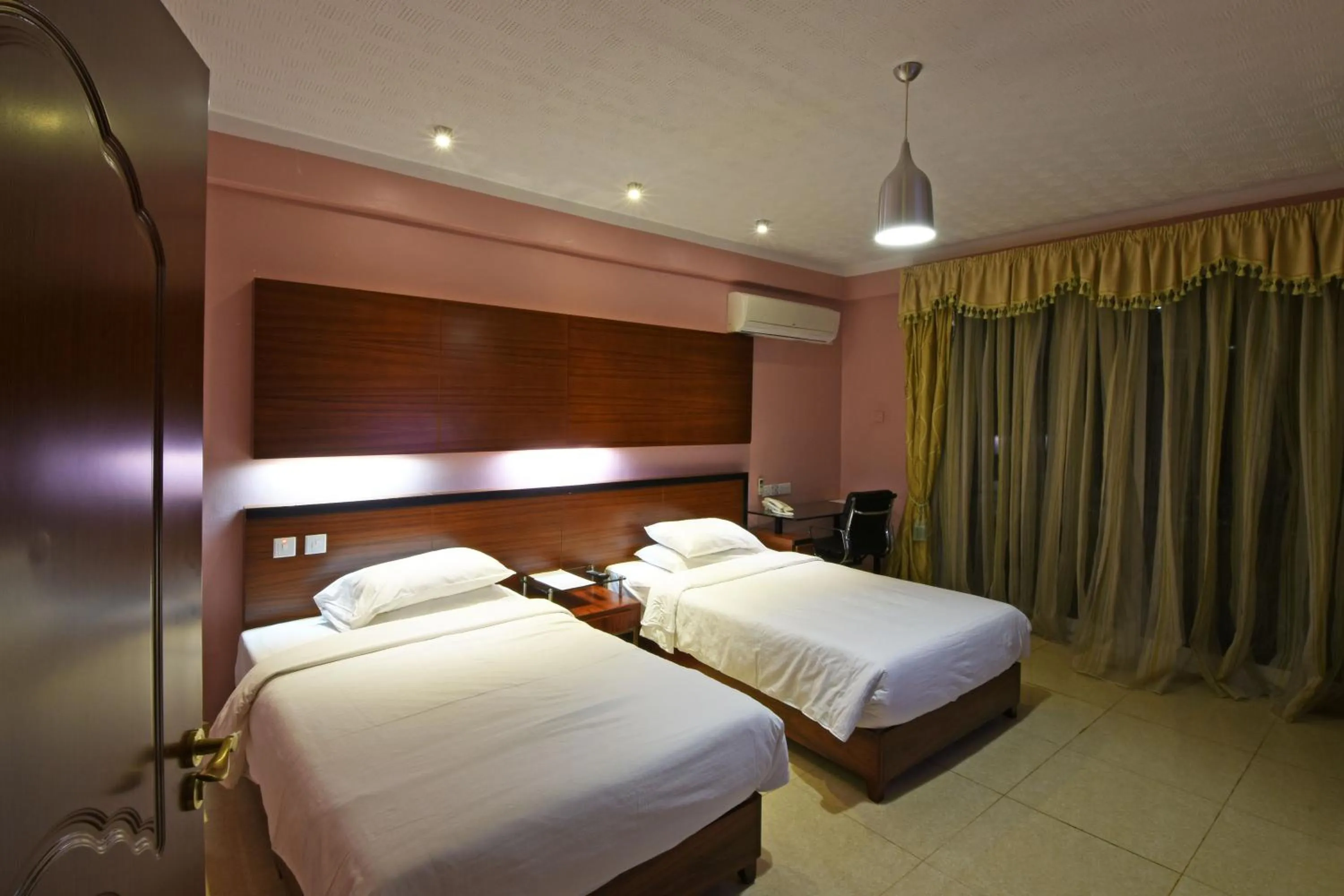 Bed in Imperial Golf View Hotel