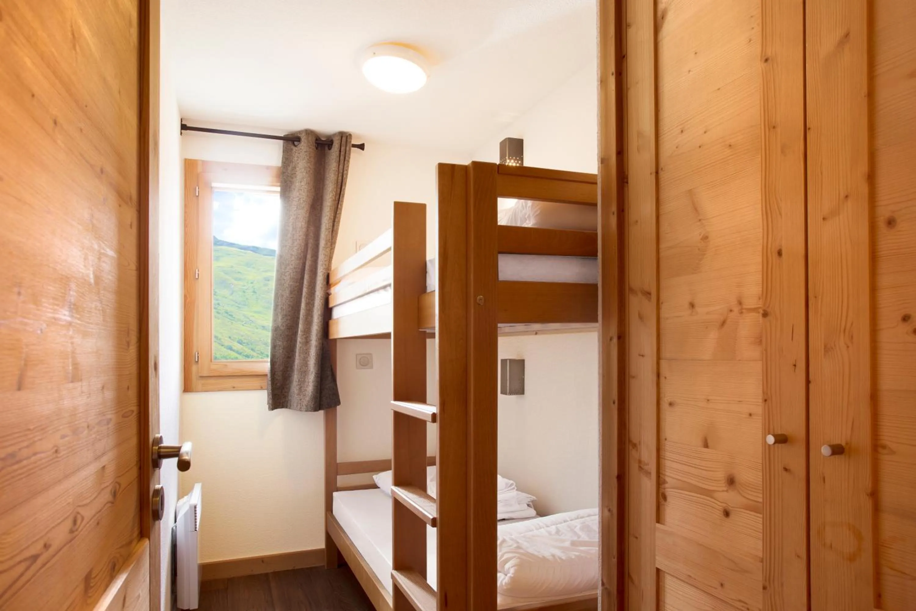 Bedroom, Bed in Résidence Club mmv Le Cœur des Loges ****