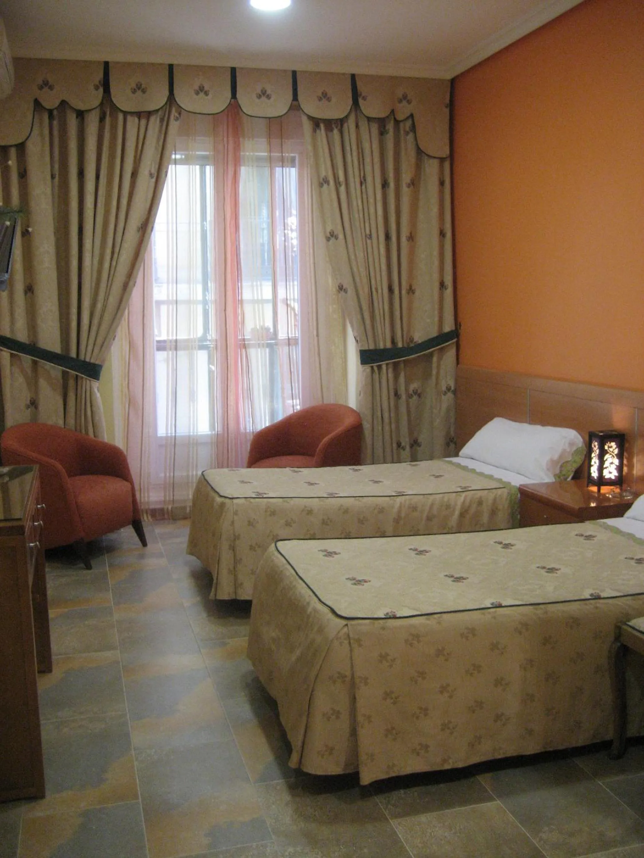 Bed in Hostal del Pez Azul