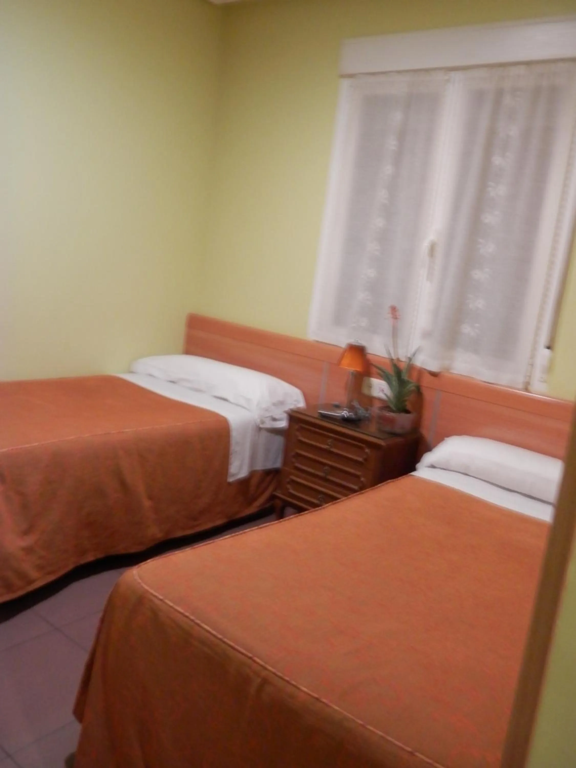 Bed in Hostal del Pez Azul